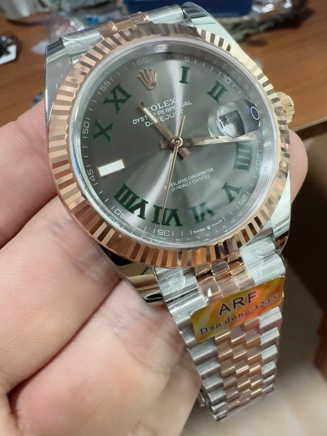 Rolex Rose Gold Green Dial — photographed off the sweep