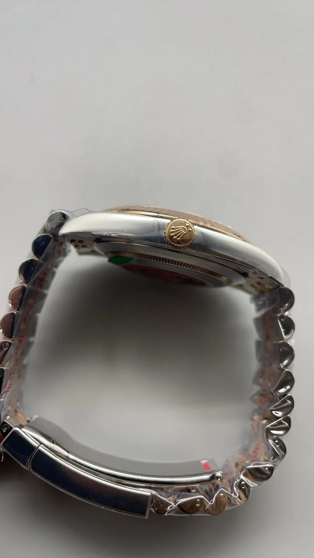 Rolex Rose Gold Green Dial — photographed off the sweep