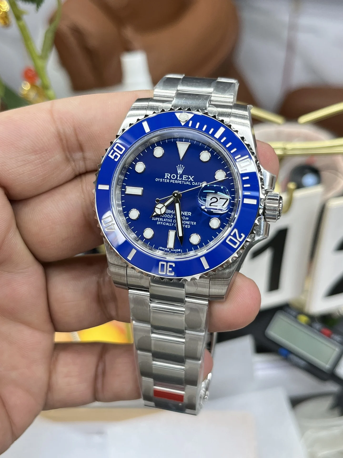 Rolex Submariner Blue Dial 40mm — photographed off the sweep