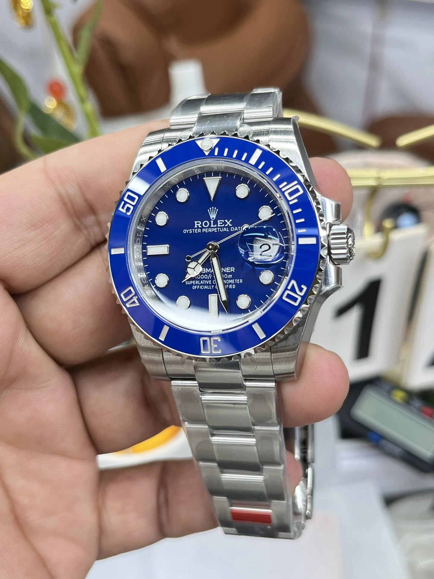 Rolex Submariner Blue Dial 40mm — photographed off the sweep