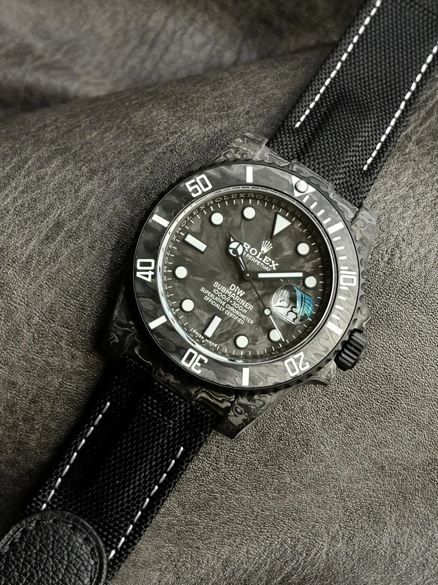 Rolex Submariner Carbon — photographed off the sweep
