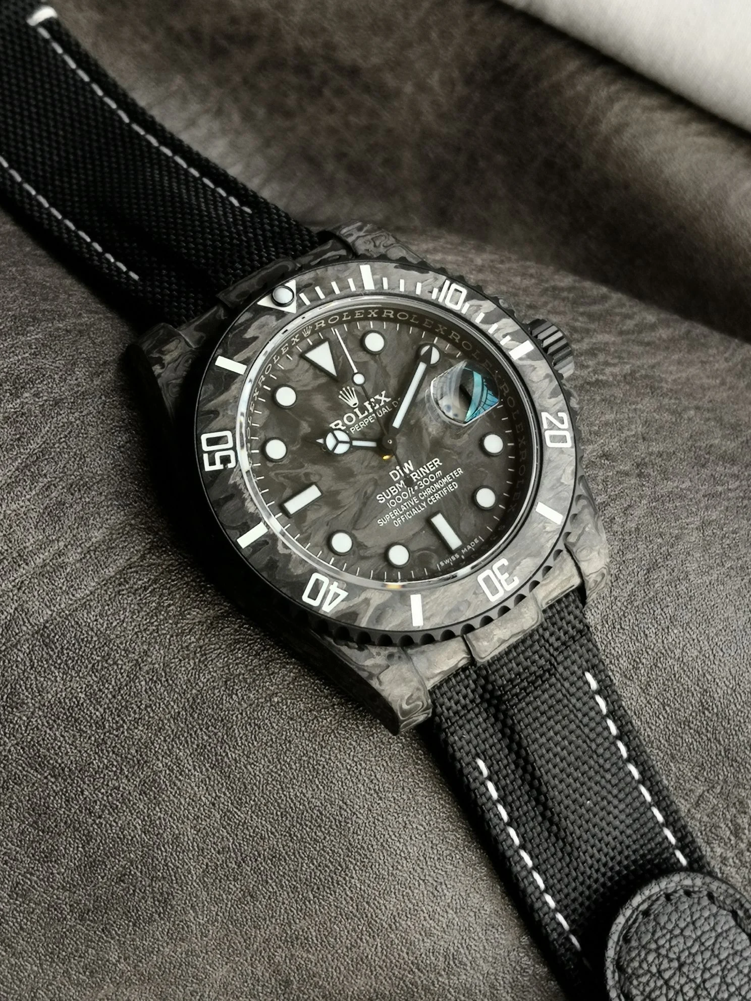 Rolex Submariner Carbon — photographed off the sweep