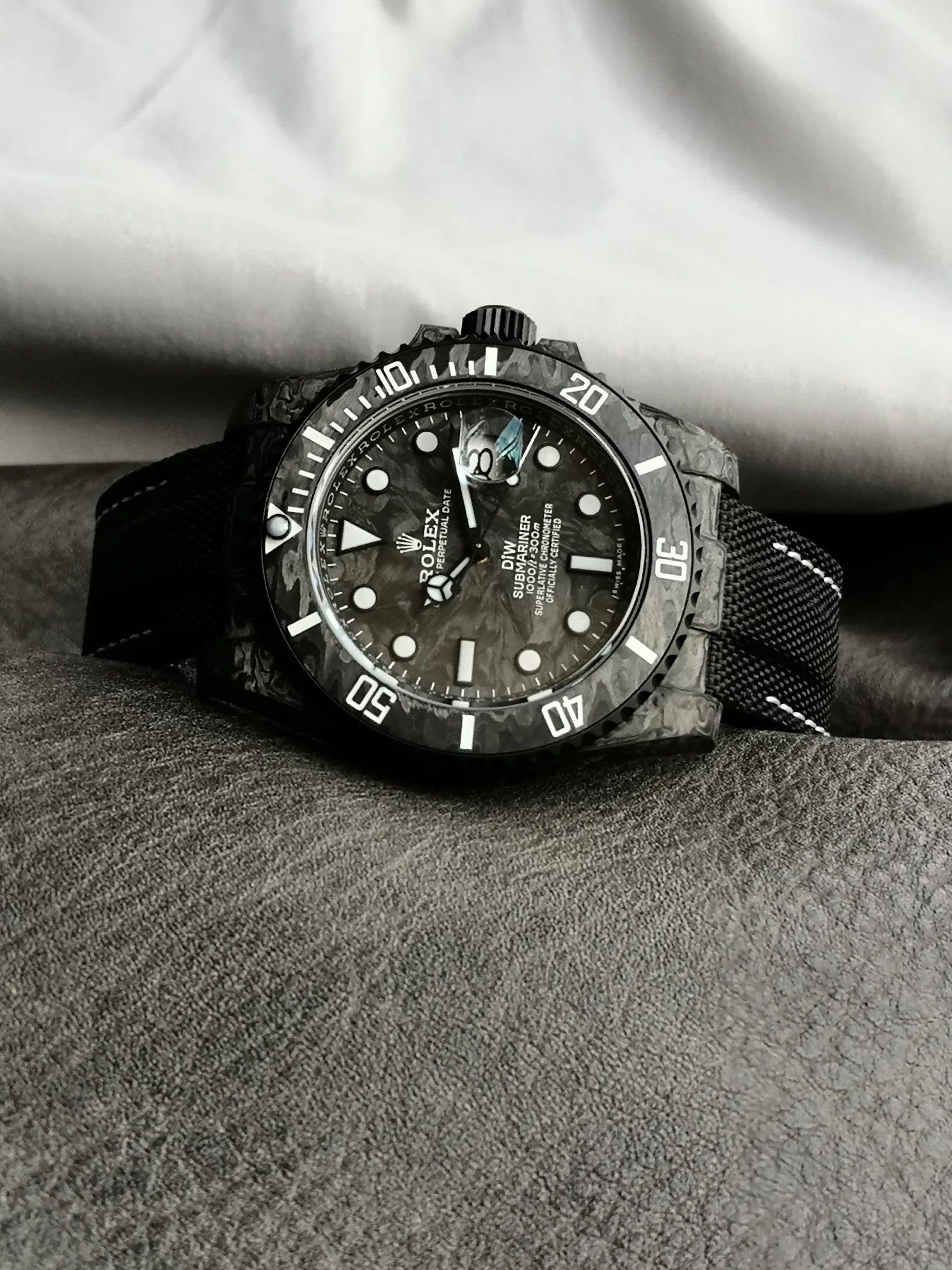 Rolex Submariner Carbon — photographed off the sweep