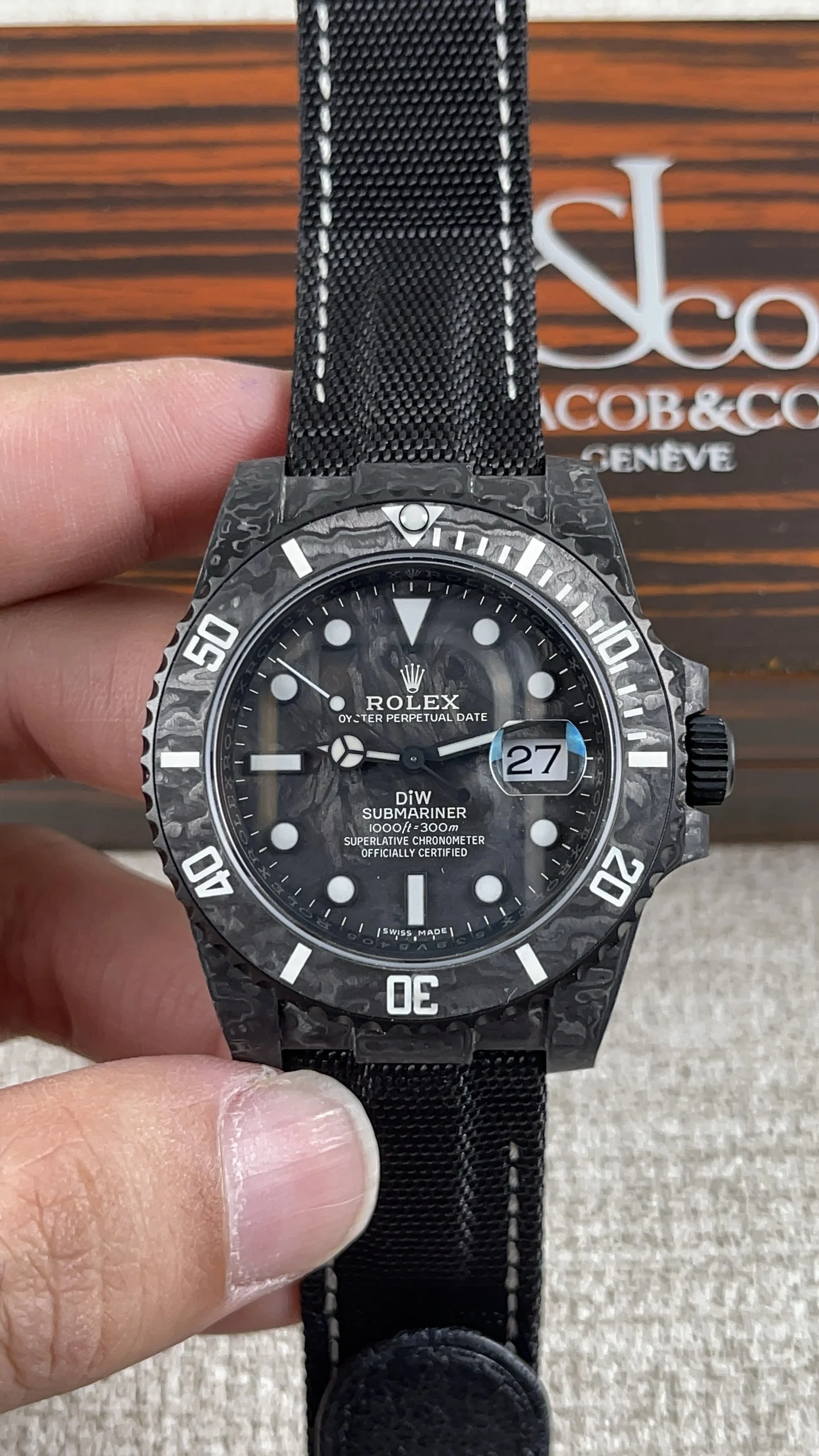 Rolex Submariner Carbon — photographed off the sweep