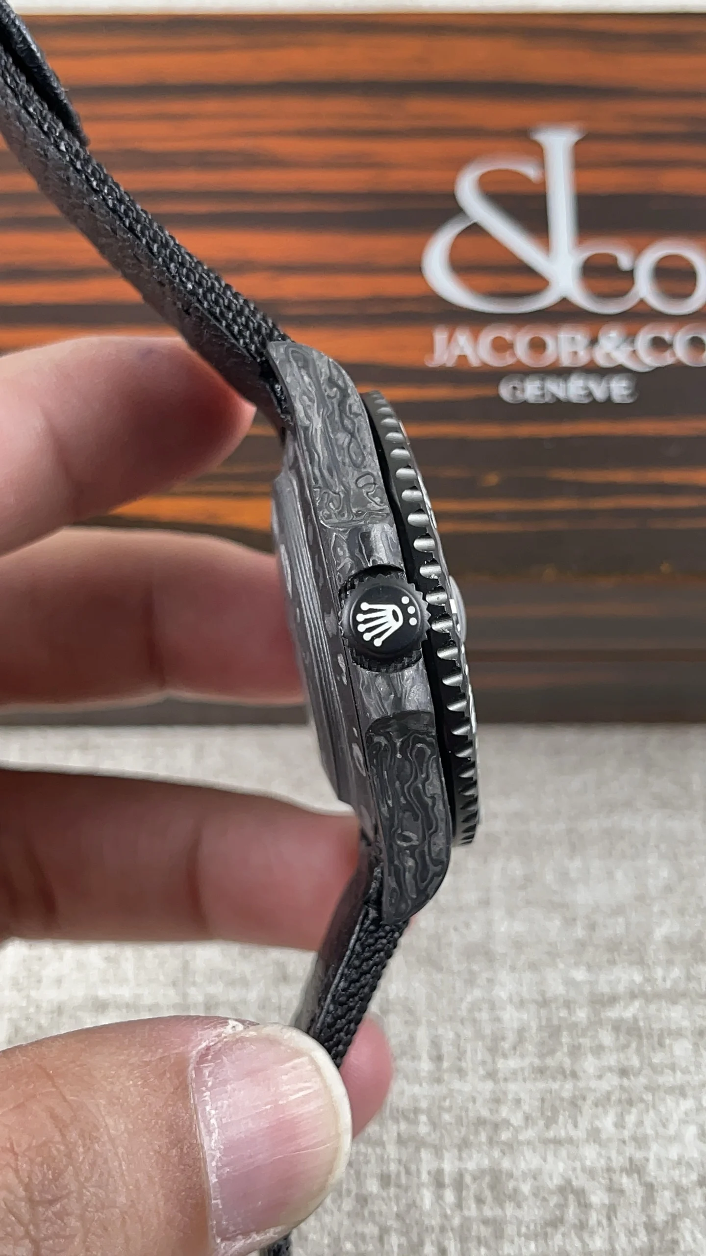 Rolex Submariner Carbon — photographed off the sweep