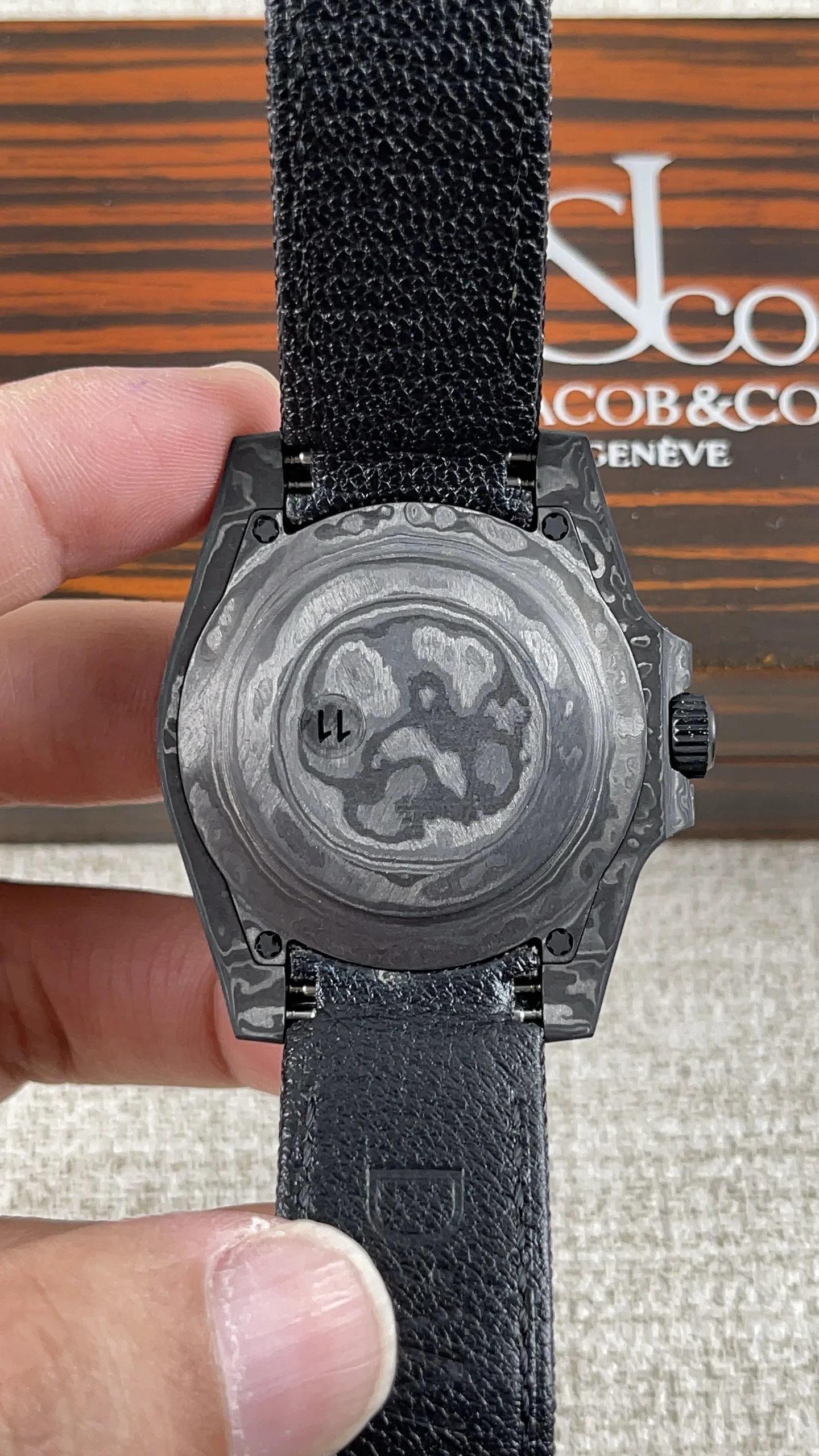 Rolex Submariner Carbon — photographed off the sweep
