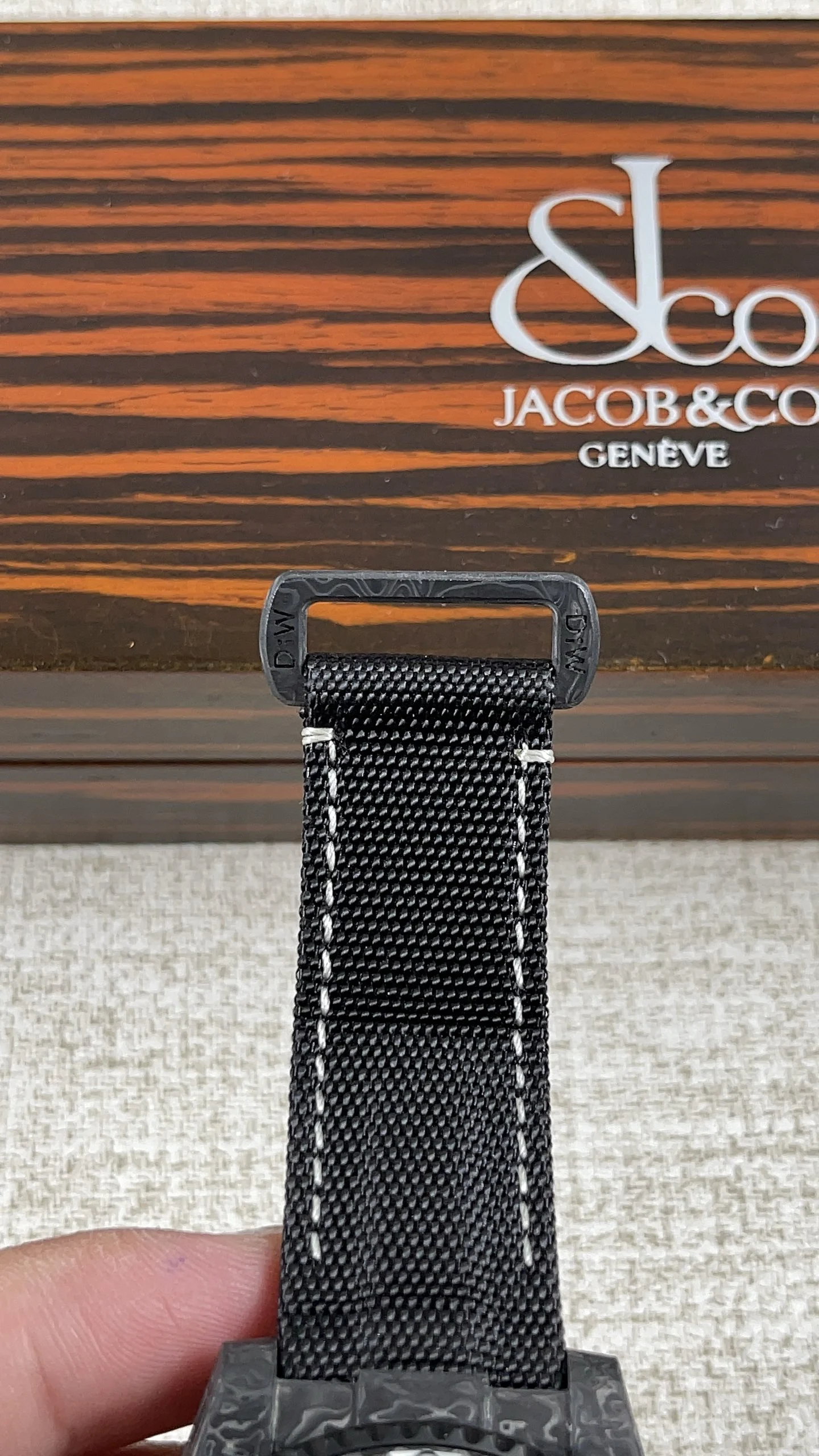 Rolex Submariner Carbon — photographed off the sweep