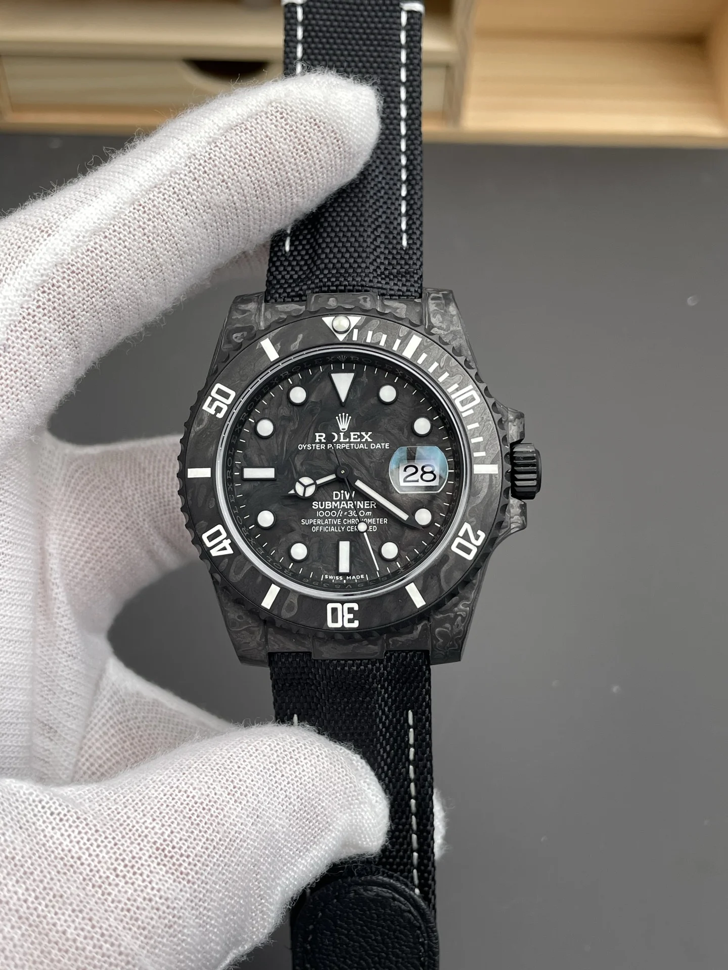 Rolex Submariner Carbon Black Dial 40mm — photographed off the sweep