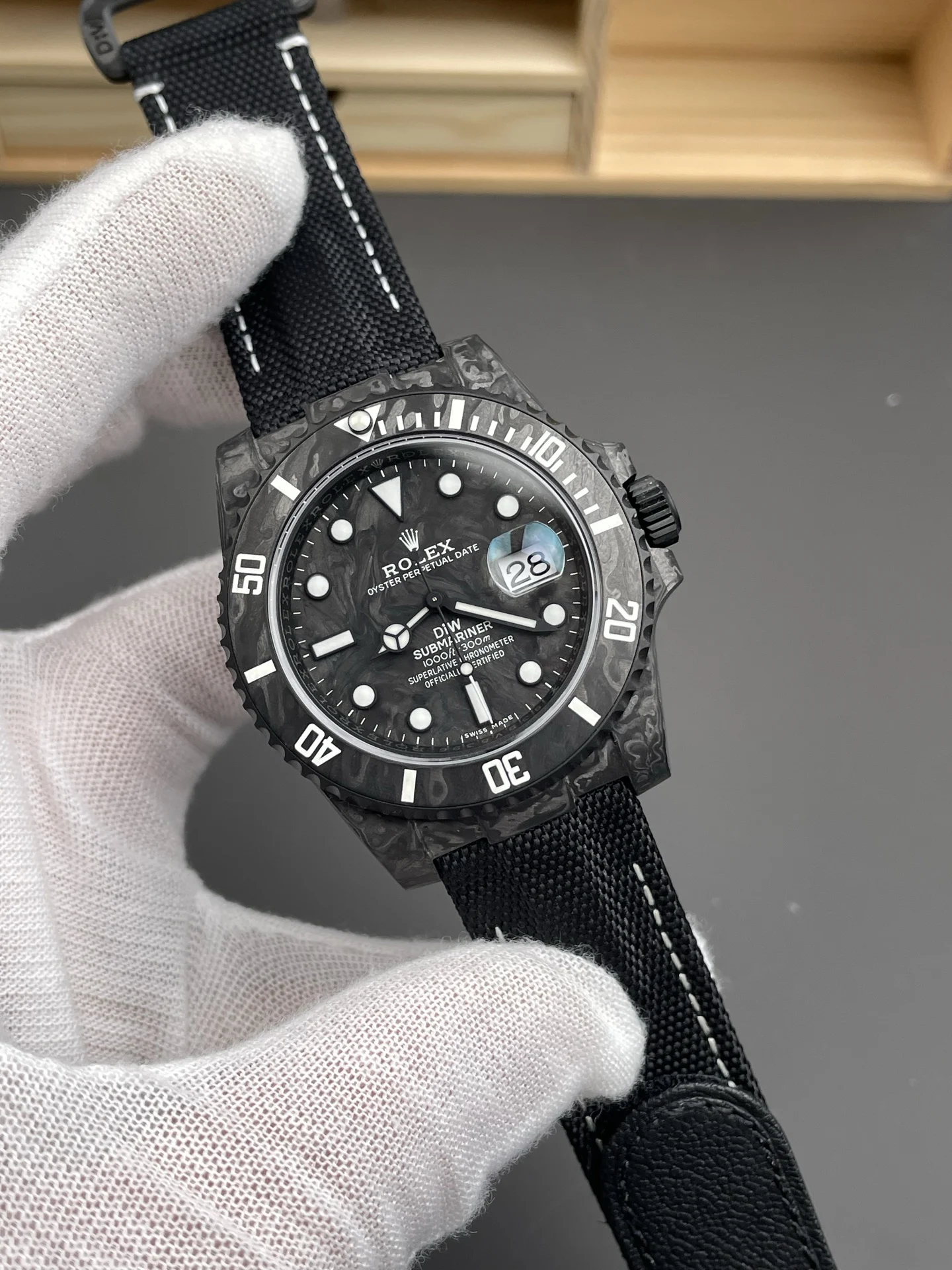 Rolex Submariner Carbon Black Dial 40mm — photographed off the sweep