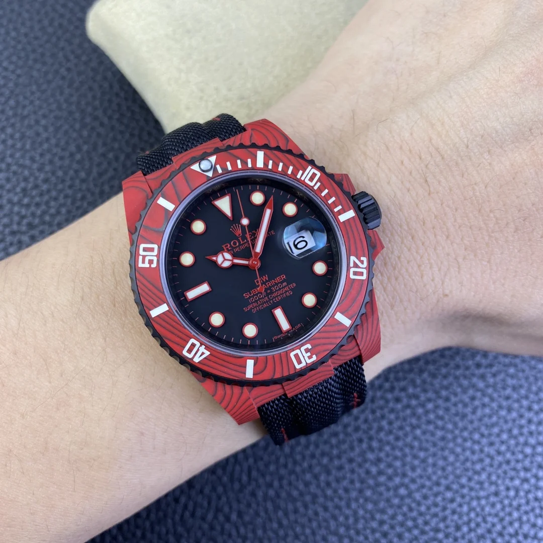 Rolex Submariner Carbon Red Dial — photographed off the sweep