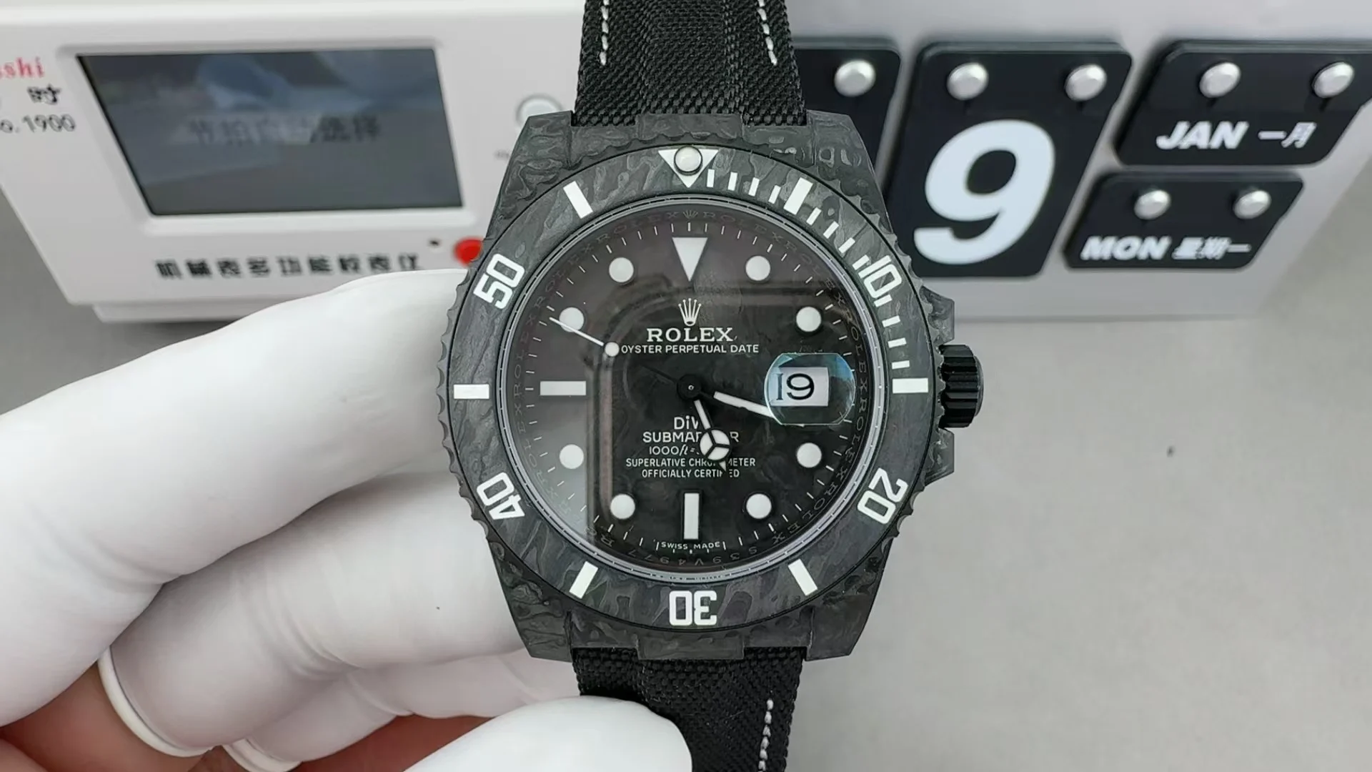 Rolex Submariner Carbon — photographed off the sweep