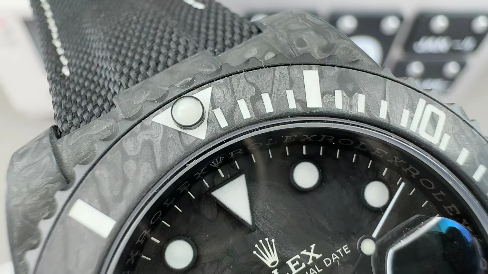 Rolex Submariner Carbon — photographed off the sweep