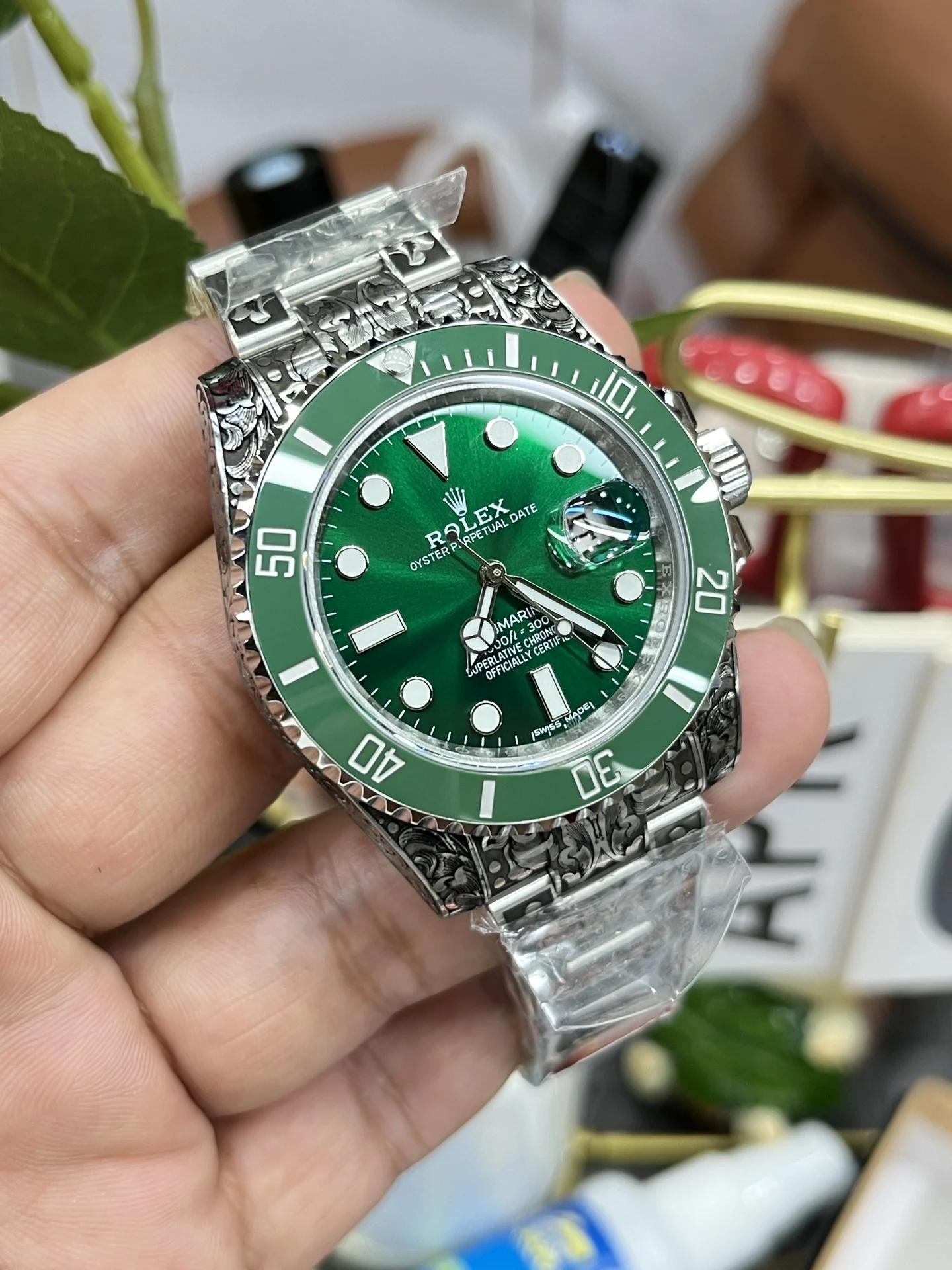 Rolex Submariner Hulk Green Dial 40mm — photographed off the sweep