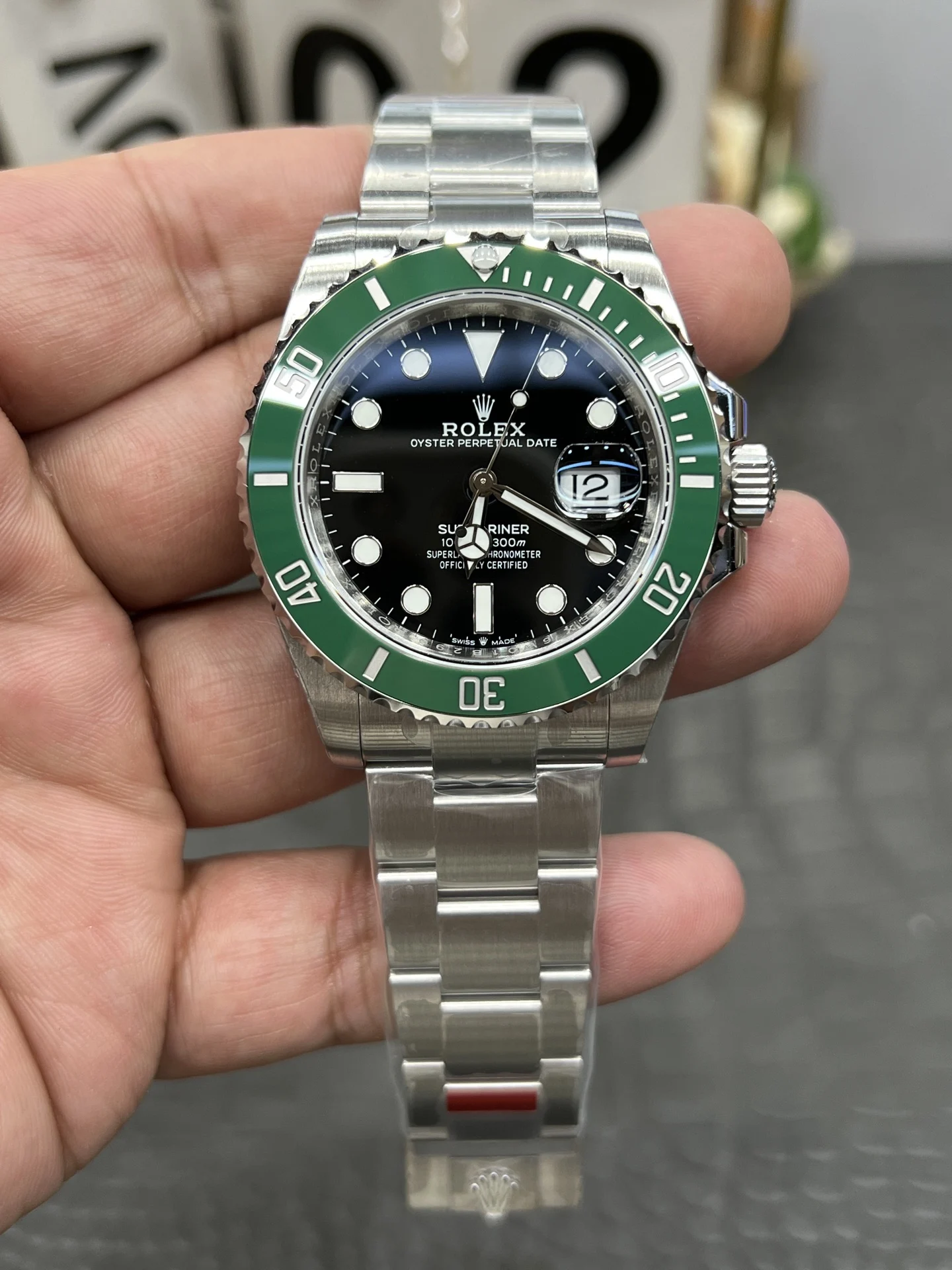 Rolex Submariner Hulk Green Dial 41mm — photographed off the sweep