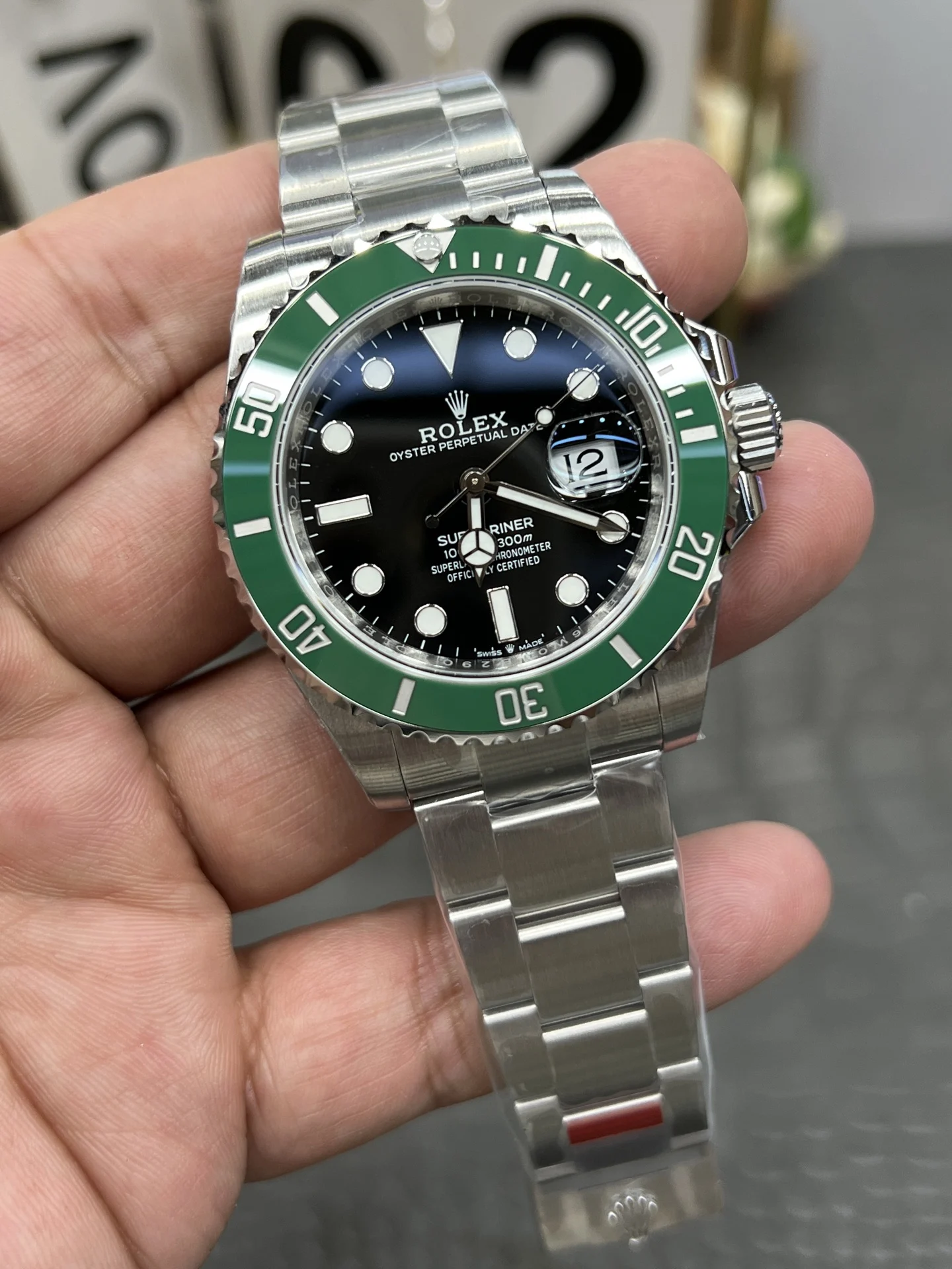 Rolex Submariner Hulk Green Dial 41mm — photographed off the sweep
