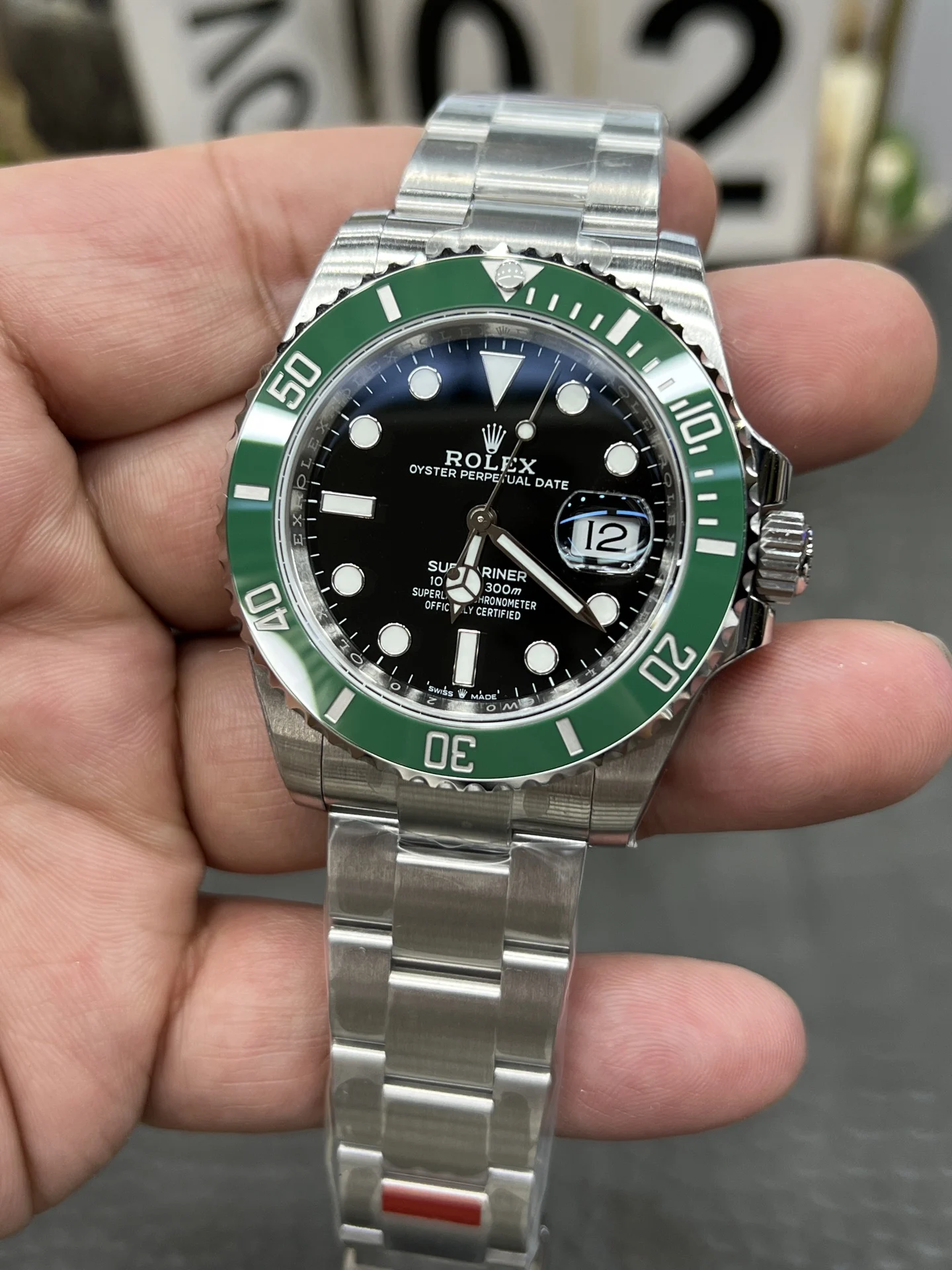 Rolex Submariner Hulk Green Dial 41mm — photographed off the sweep