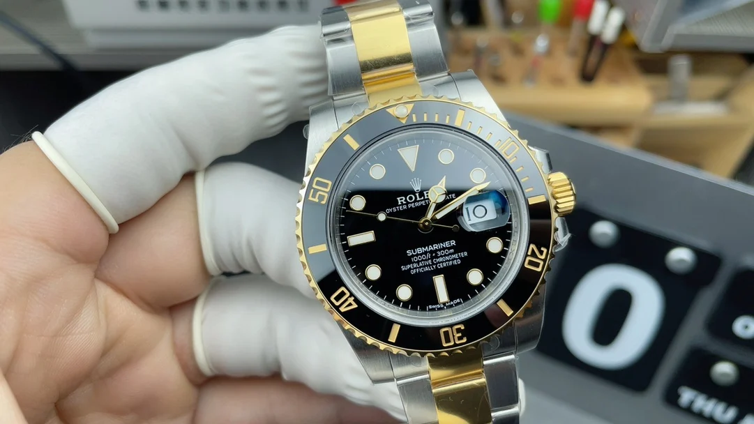 Rolex Submariner Two-Tone Black Dial 40mm — photographed off the sweep