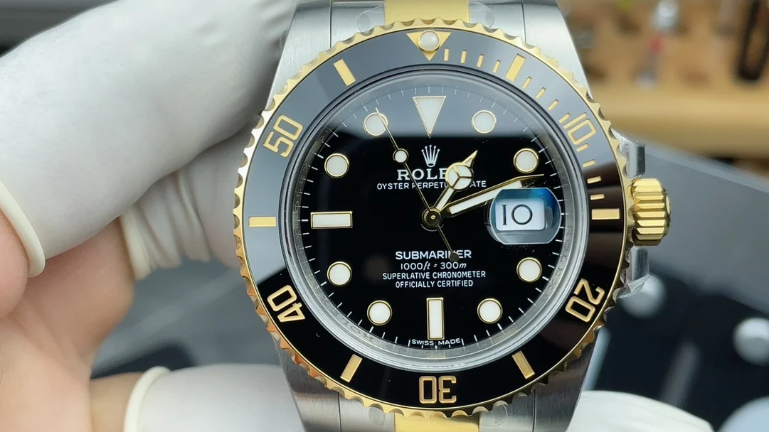 Rolex Submariner Two-Tone Black Dial 40mm — photographed off the sweep