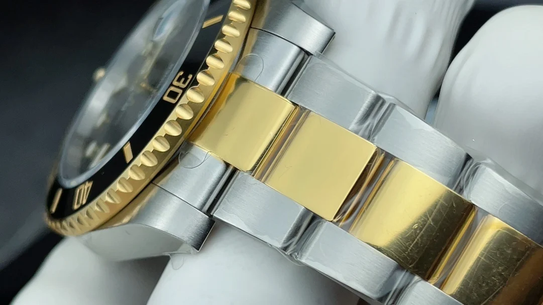 Rolex Submariner Two-Tone Black Dial 40mm — photographed off the sweep