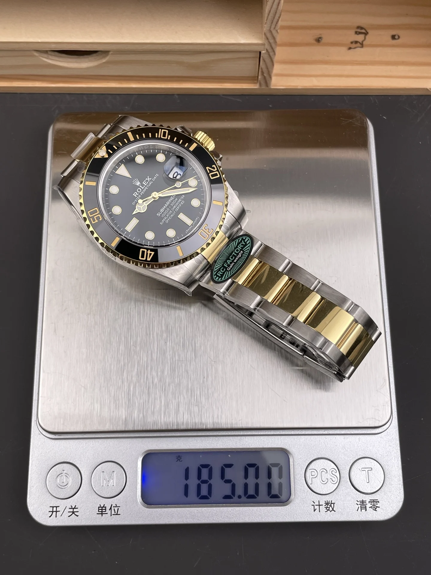 Rolex Submariner Two-Tone Black Dial 40mm — photographed off the sweep