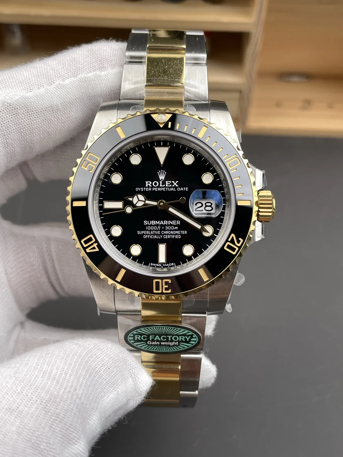 Rolex Submariner Two-Tone Black Dial 40mm — photographed off the sweep