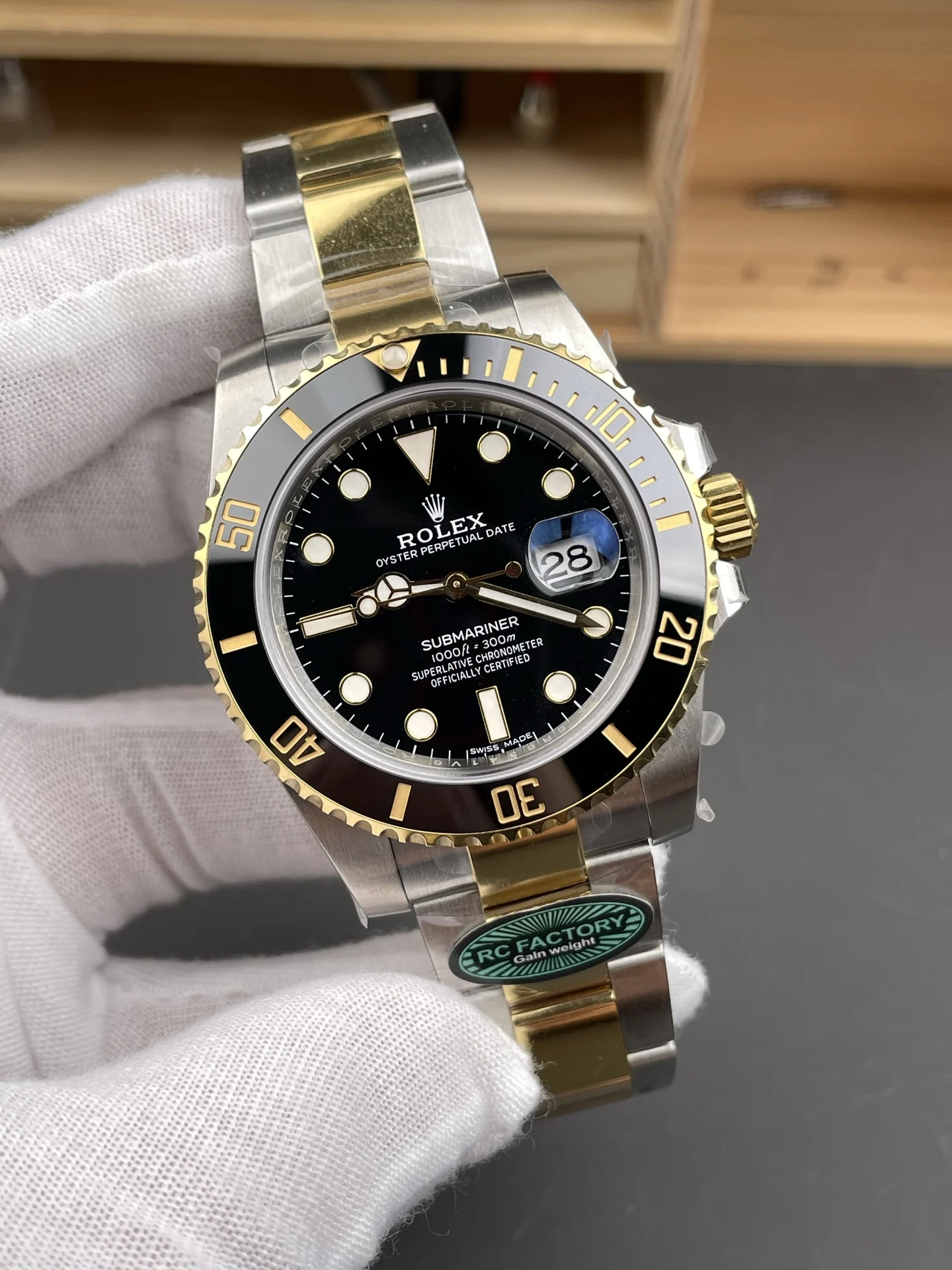 Rolex Submariner Two-Tone Black Dial 40mm — photographed off the sweep