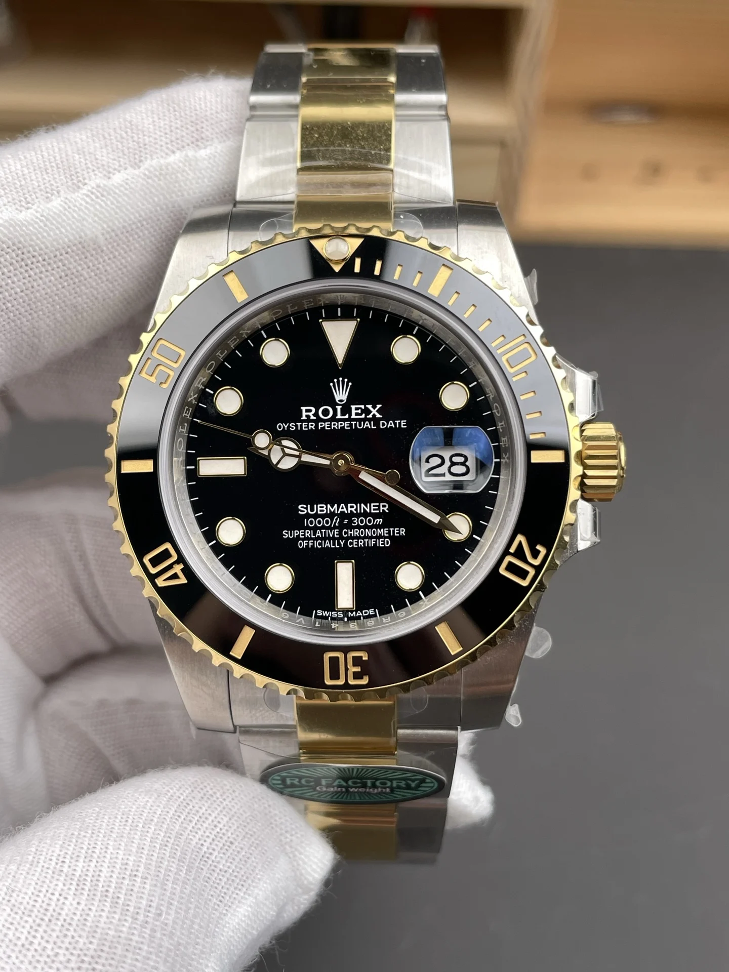 Rolex Submariner Two-Tone Black Dial 40mm — photographed off the sweep
