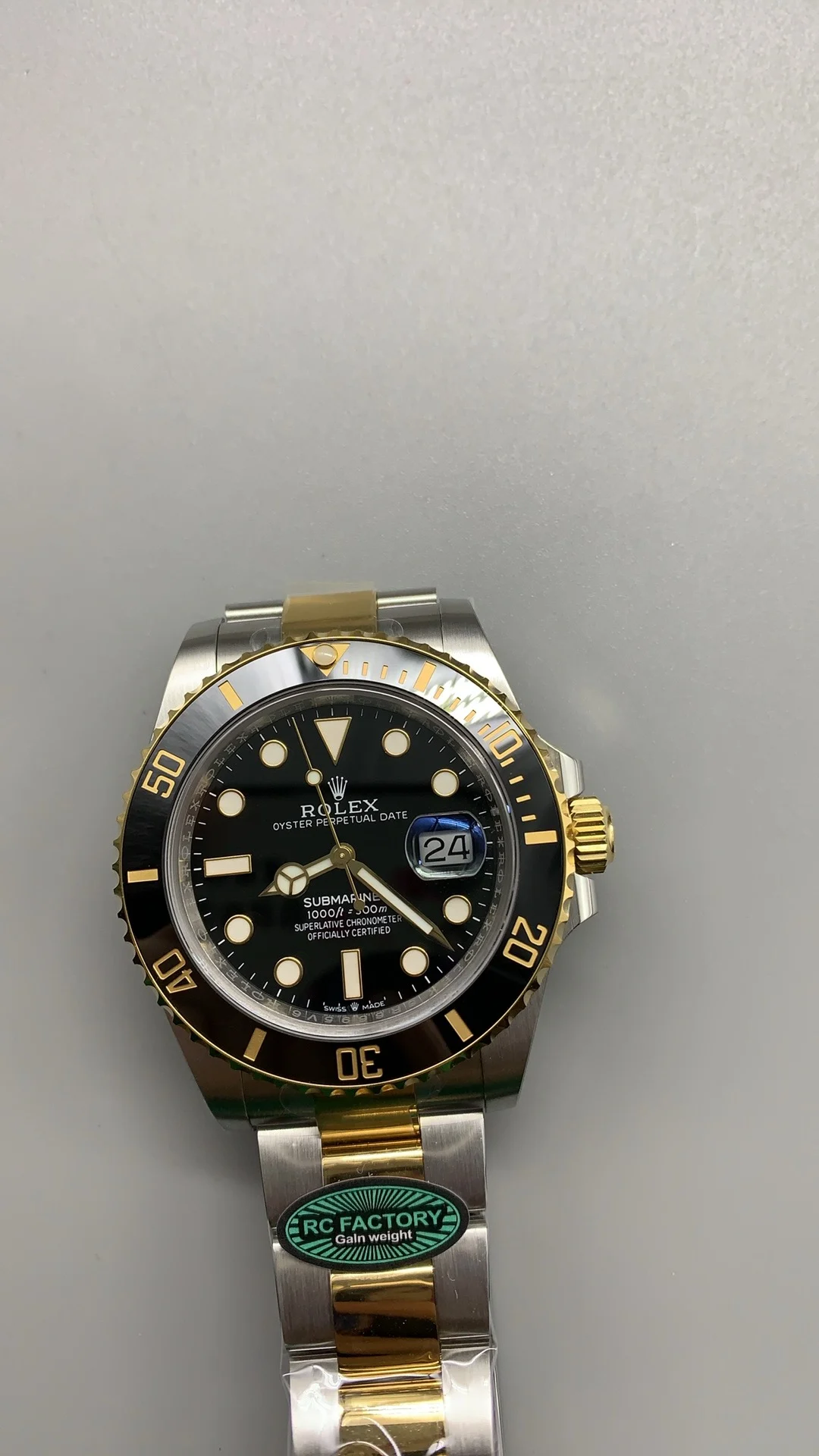 Rolex Submariner Two-Tone Black Dial 41mm — photographed off the sweep
