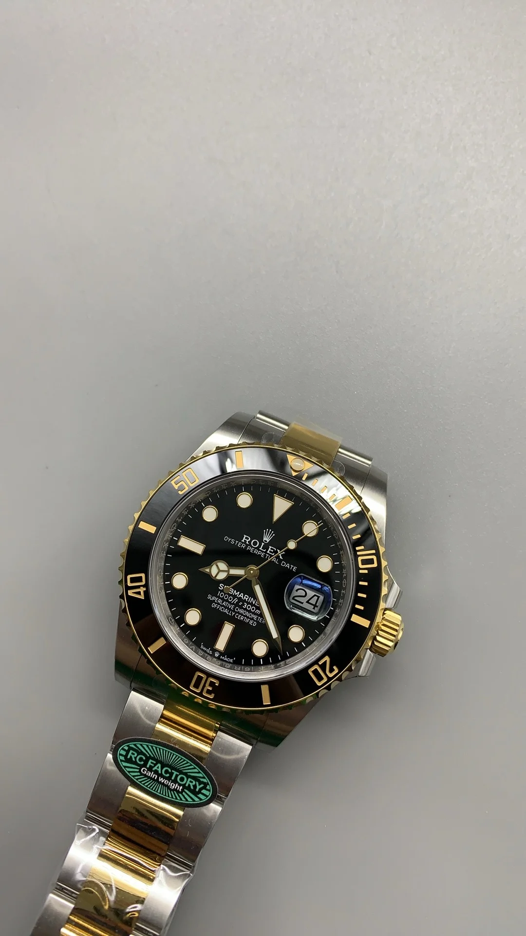 Rolex Submariner Two-Tone Black Dial 41mm — photographed off the sweep