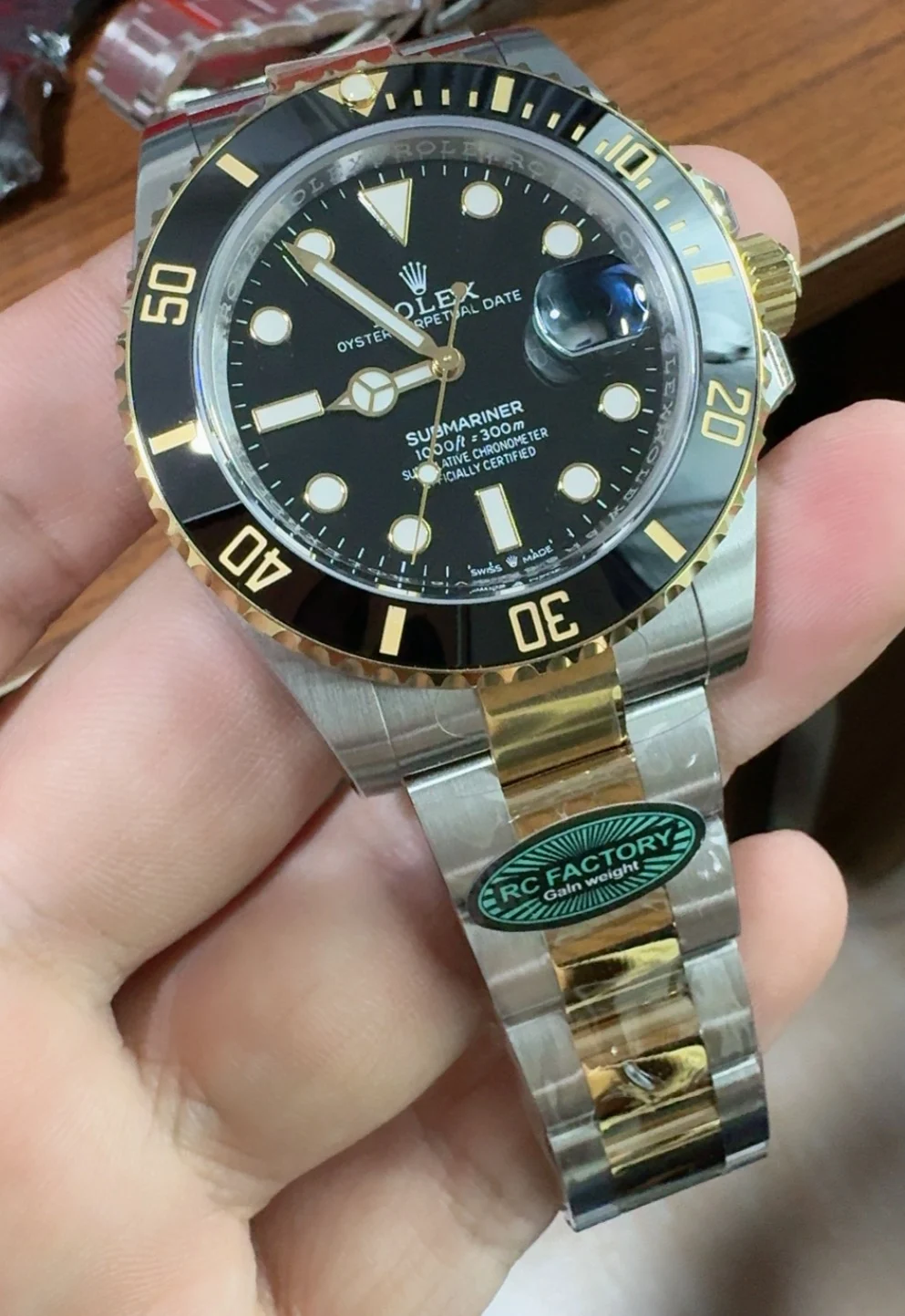 Rolex Submariner Two-Tone Black Dial 41mm — photographed off the sweep