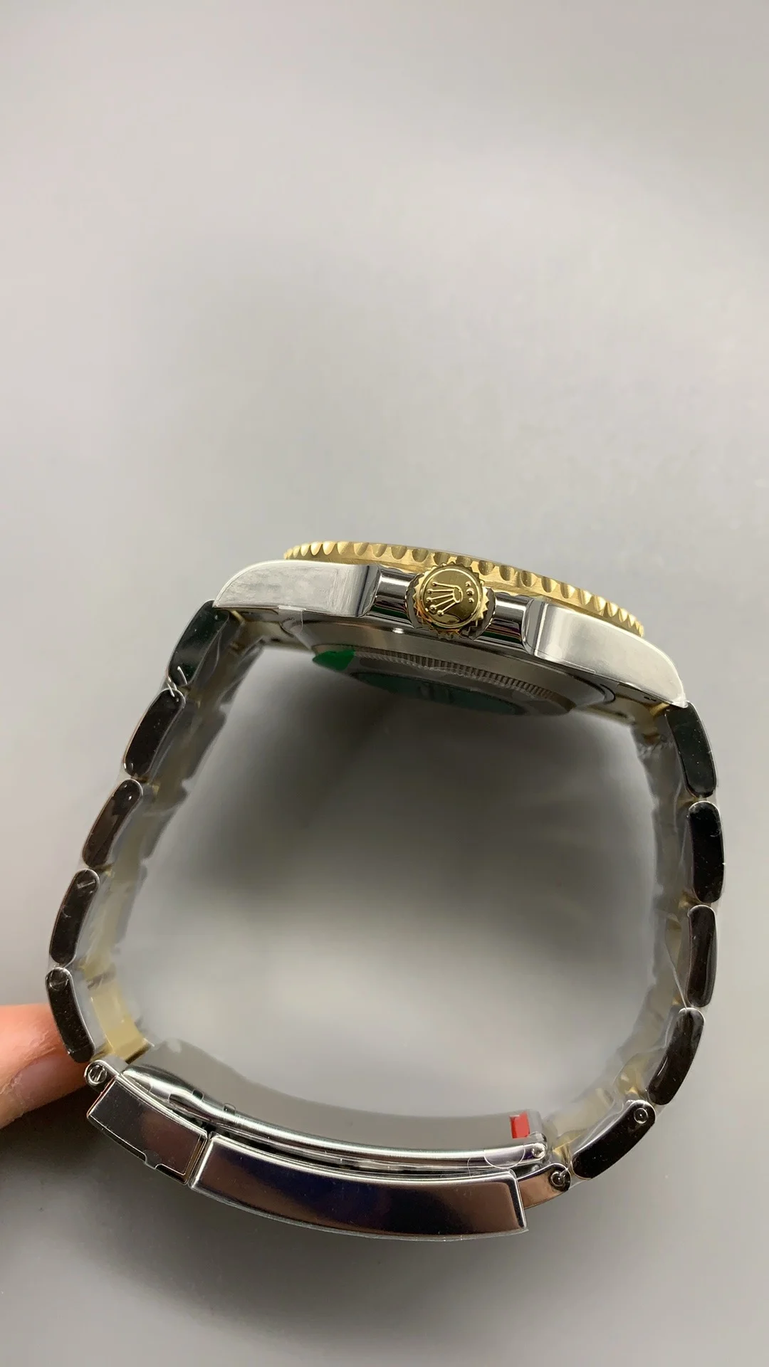Rolex Submariner Two-Tone Black Dial 41mm — photographed off the sweep