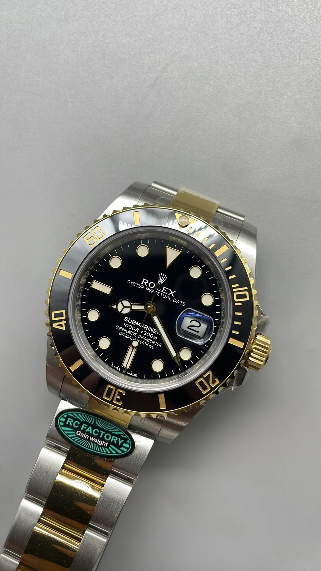 Rolex Submariner Two-Tone Black Dial 41mm — photographed off the sweep