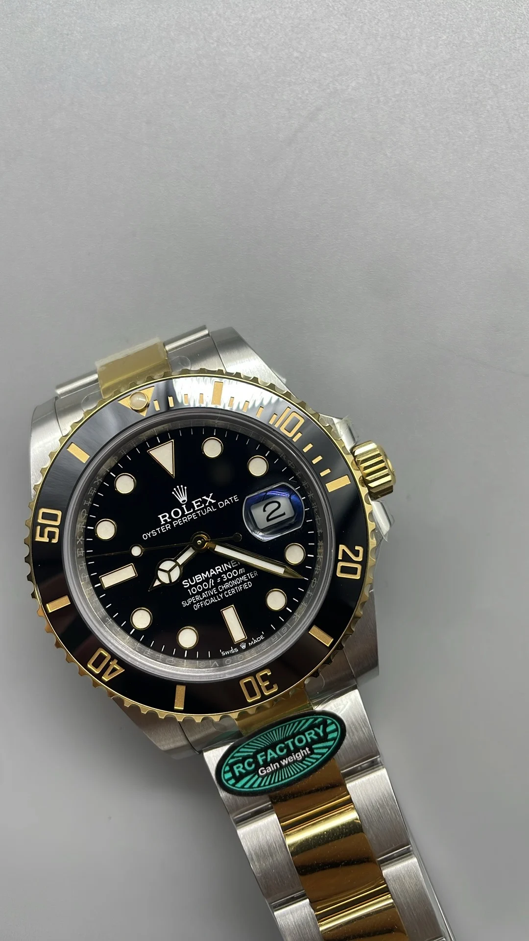 Rolex Submariner Two-Tone Black Dial 41mm — photographed off the sweep