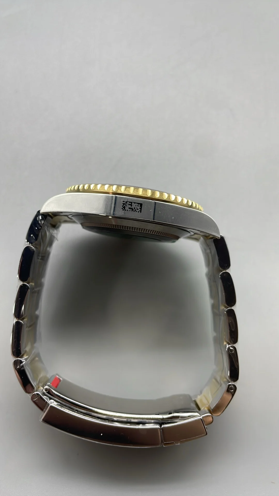 Rolex Submariner Two-Tone Black Dial 41mm — photographed off the sweep