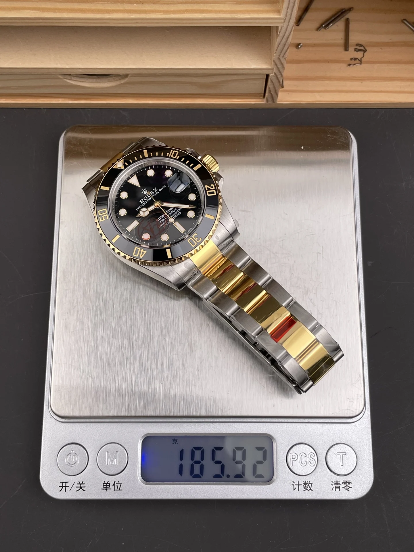 Rolex Submariner Two-Tone Black Dial 41mm — photographed off the sweep