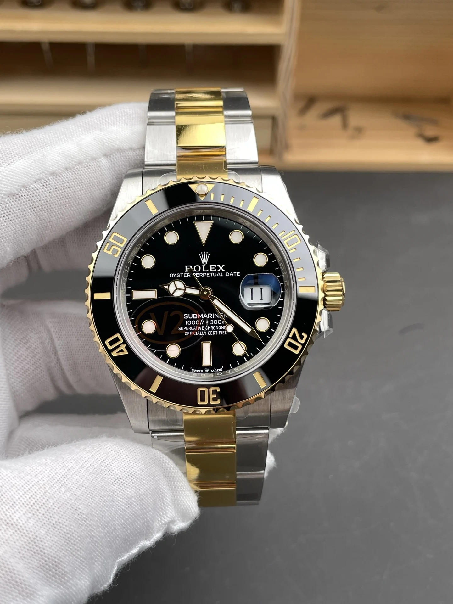 Rolex Submariner Two-Tone Black Dial 41mm — photographed off the sweep