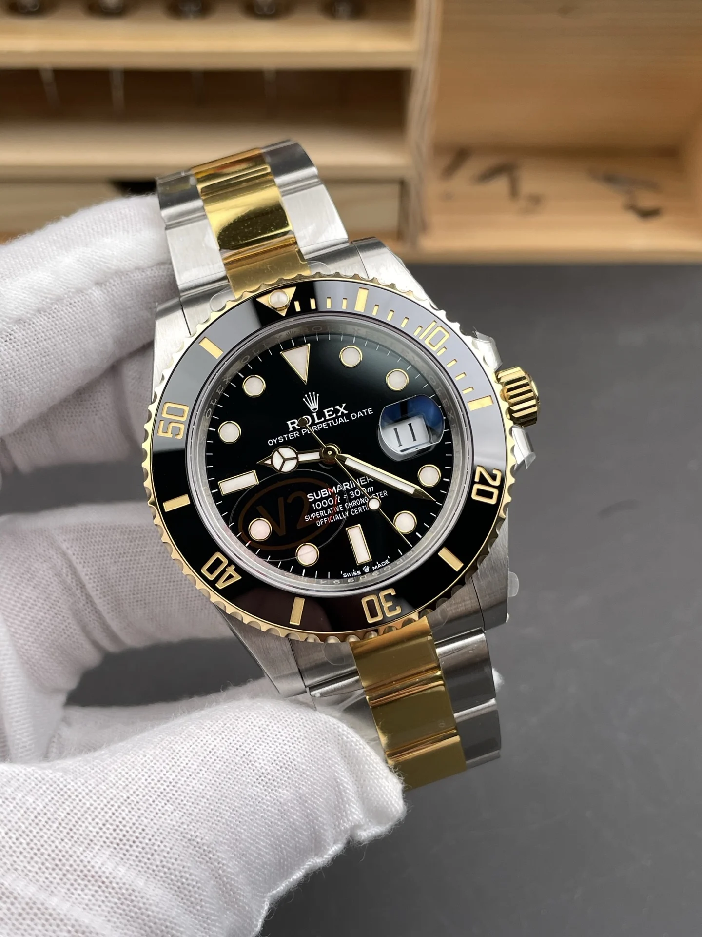 Rolex Submariner Two-Tone Black Dial 41mm — photographed off the sweep