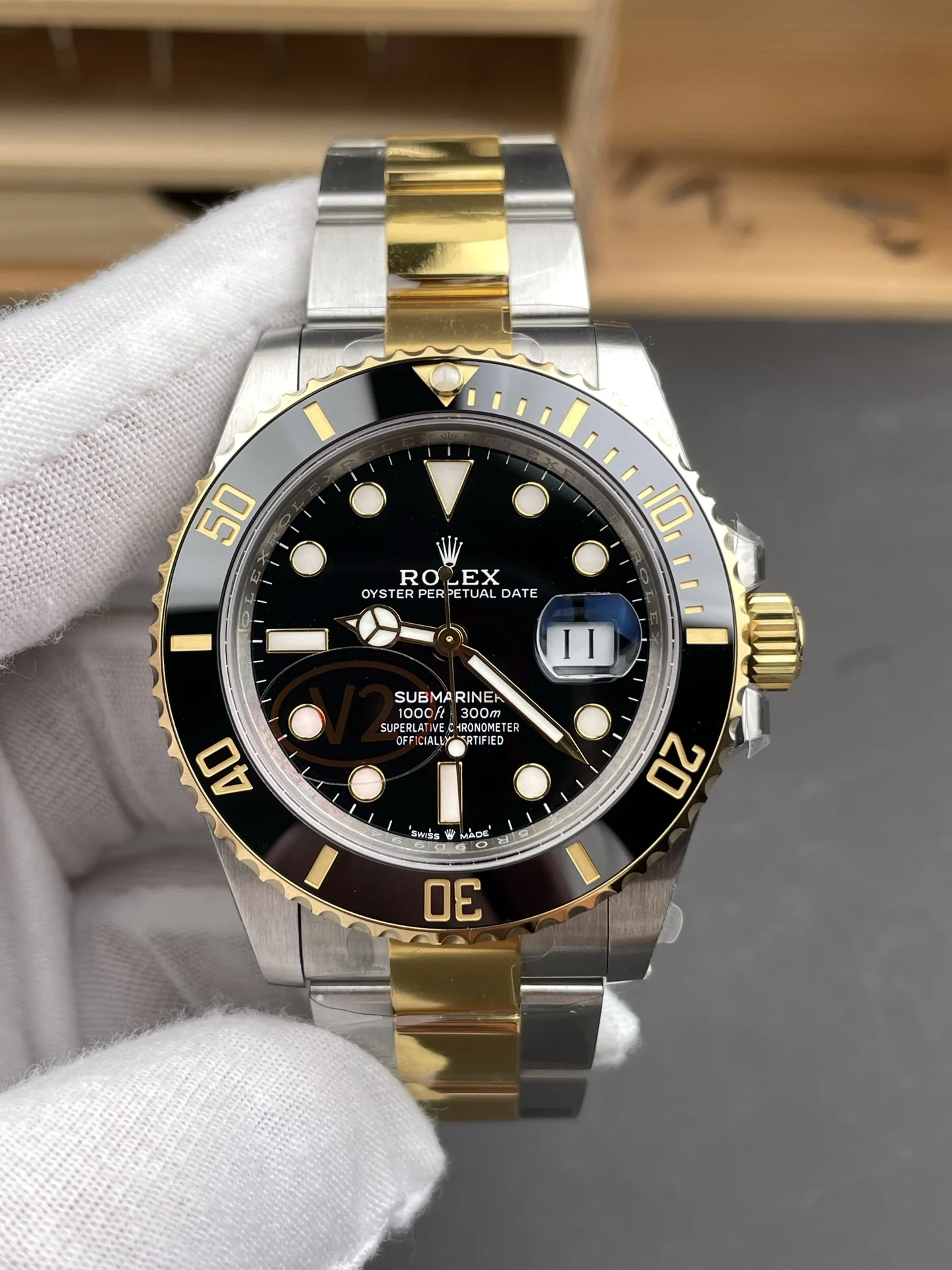 Rolex Submariner Two-Tone Black Dial 41mm — photographed off the sweep