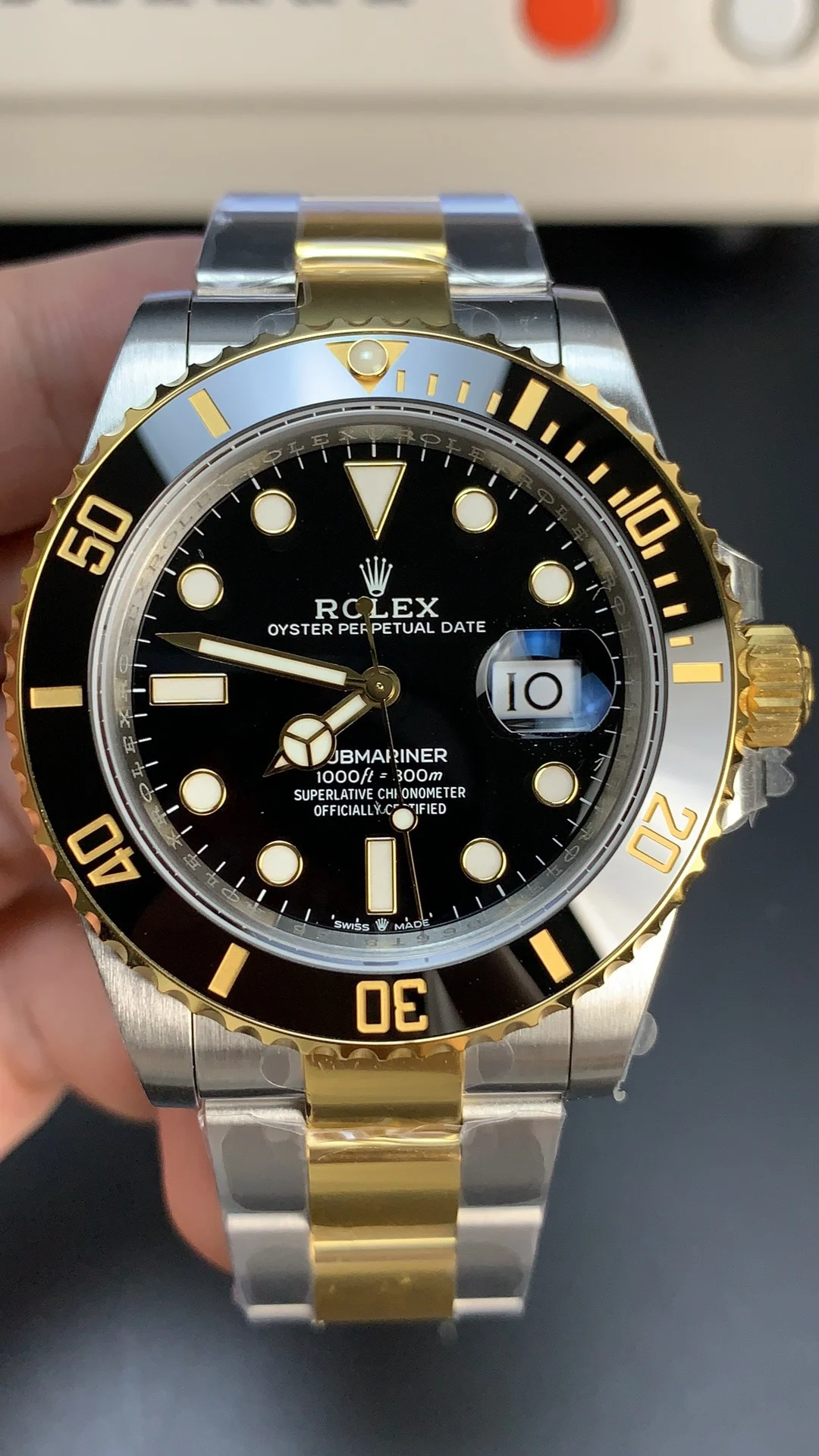 Rolex Submariner Two-Tone Black Dial 41mm — photographed off the sweep