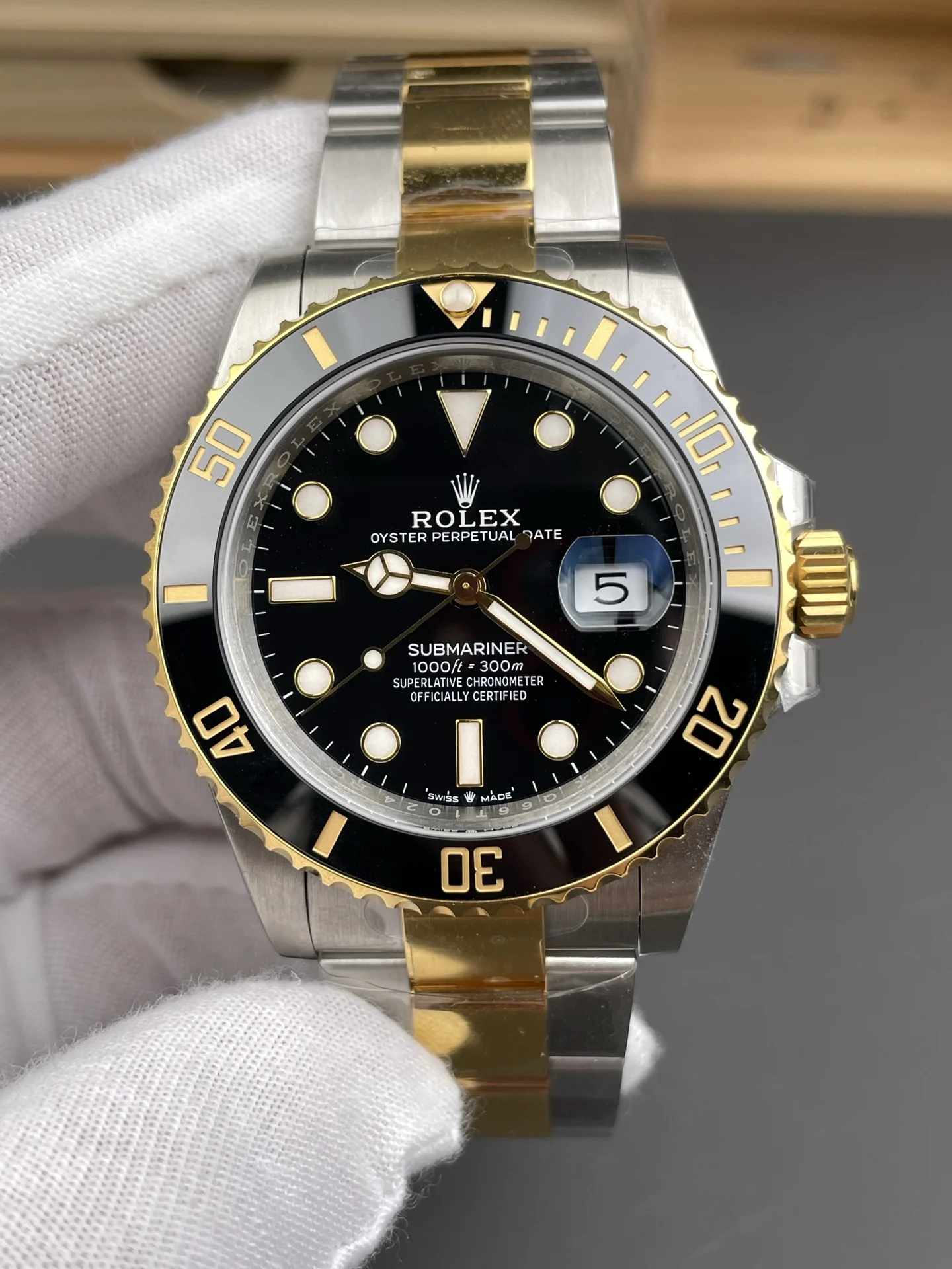 Rolex Submariner Two-Tone Black Dial 41mm — photographed off the sweep