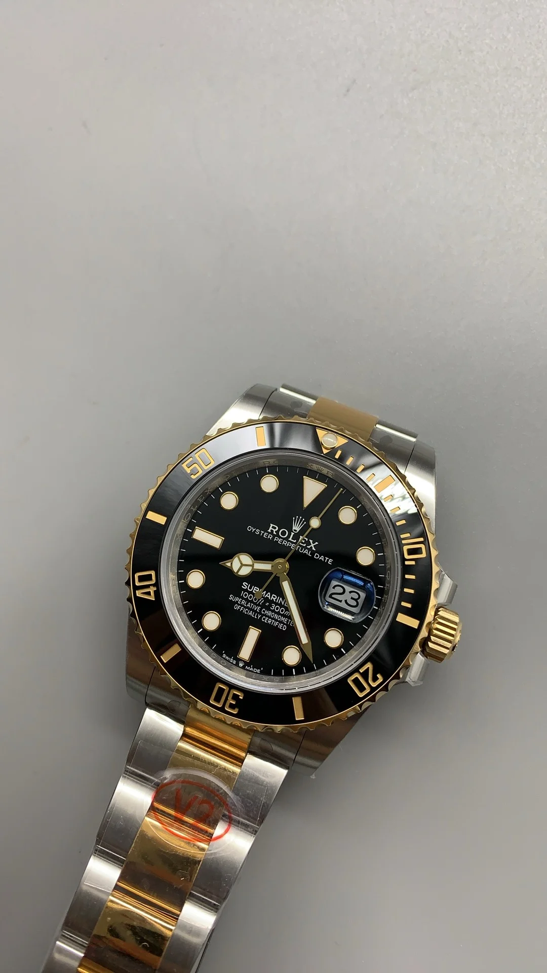 Rolex Submariner Two-Tone Black Dial 41mm — photographed off the sweep