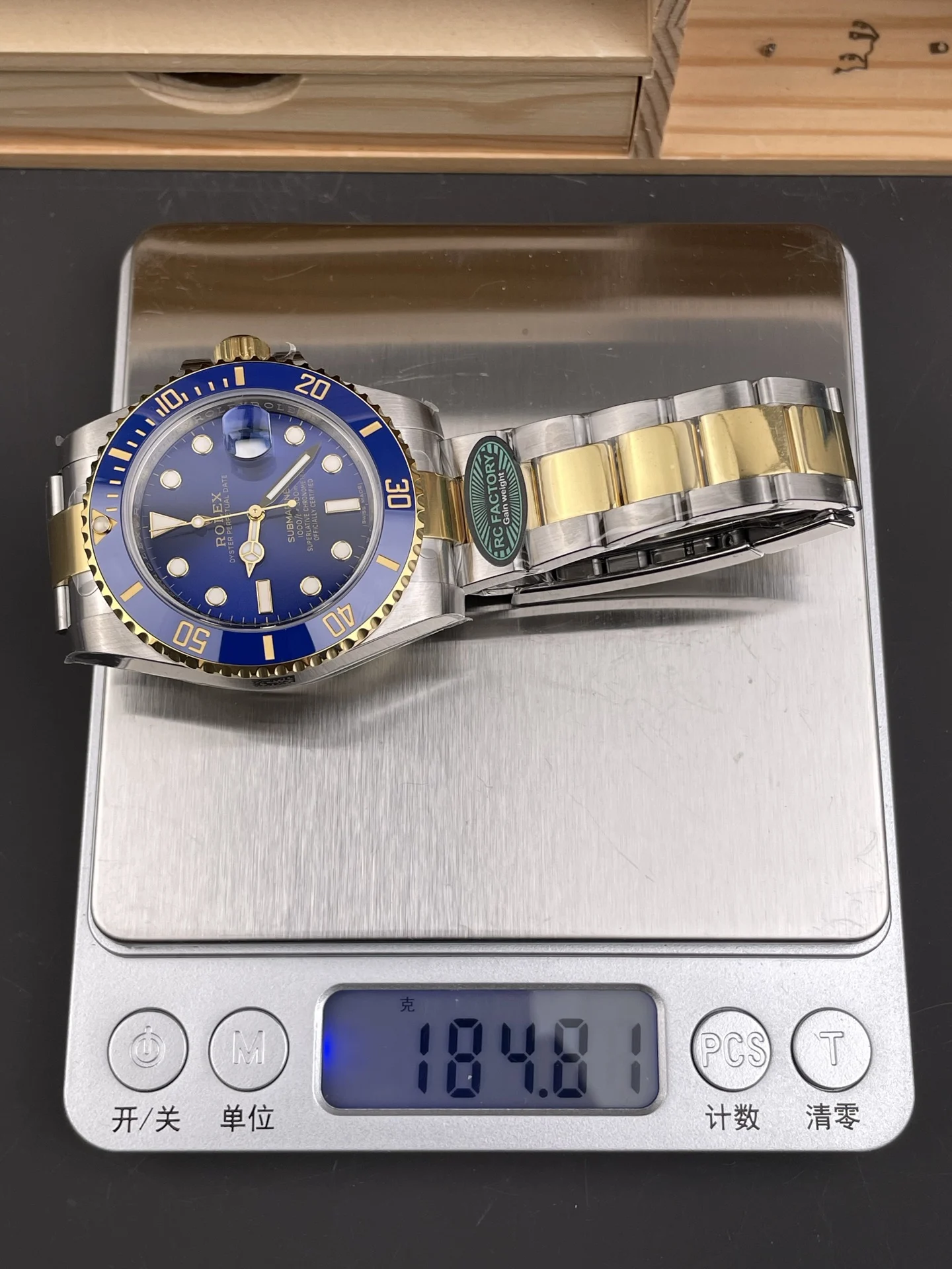 Rolex Submariner Two-Tone Blue Dial 40mm — photographed off the sweep