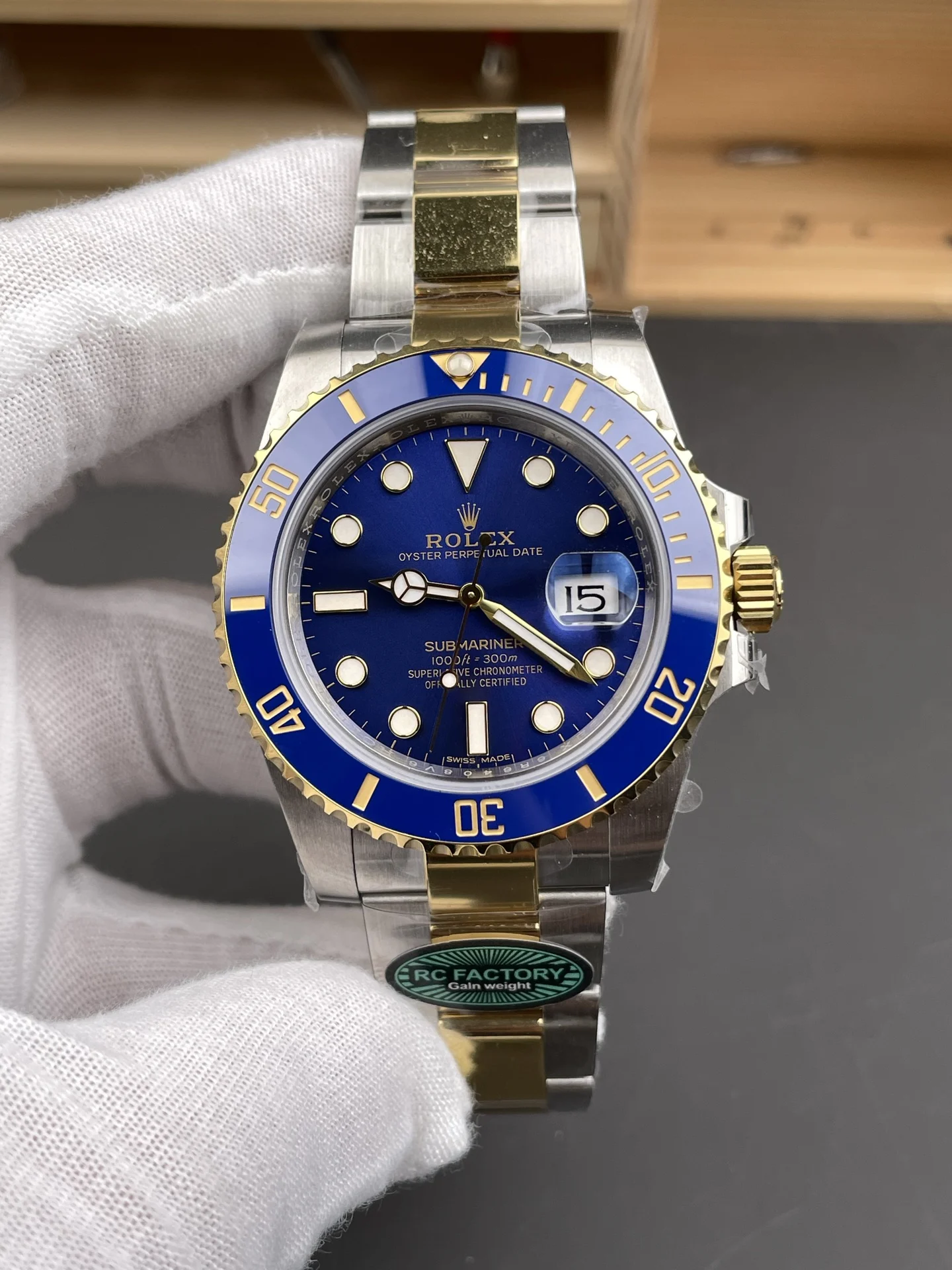 Rolex Submariner Two-Tone Blue Dial 40mm — photographed off the sweep