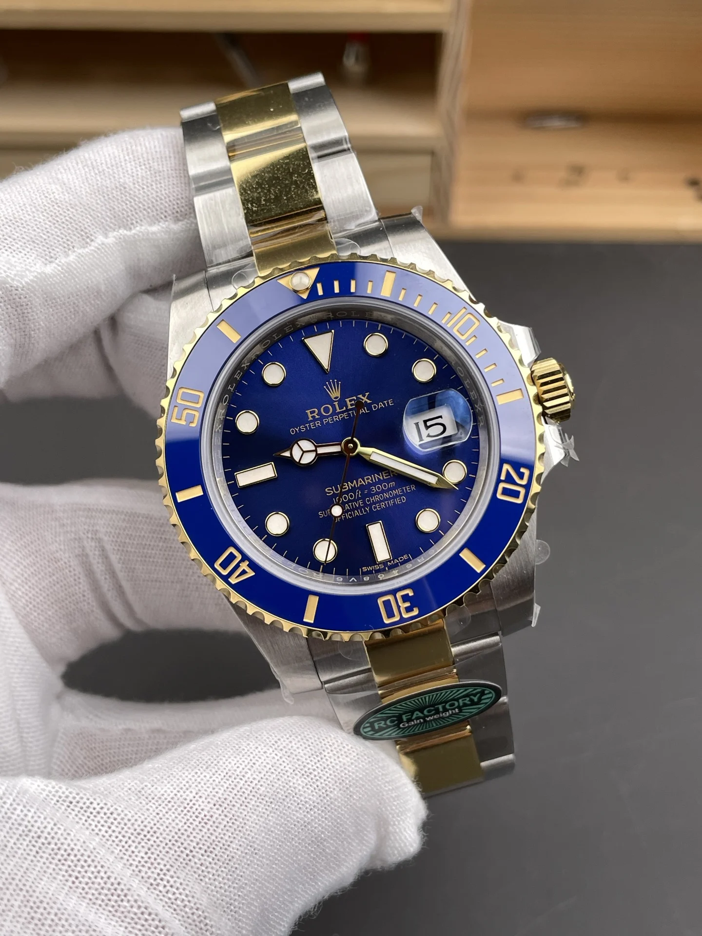 Rolex Submariner Two-Tone Blue Dial 40mm — photographed off the sweep