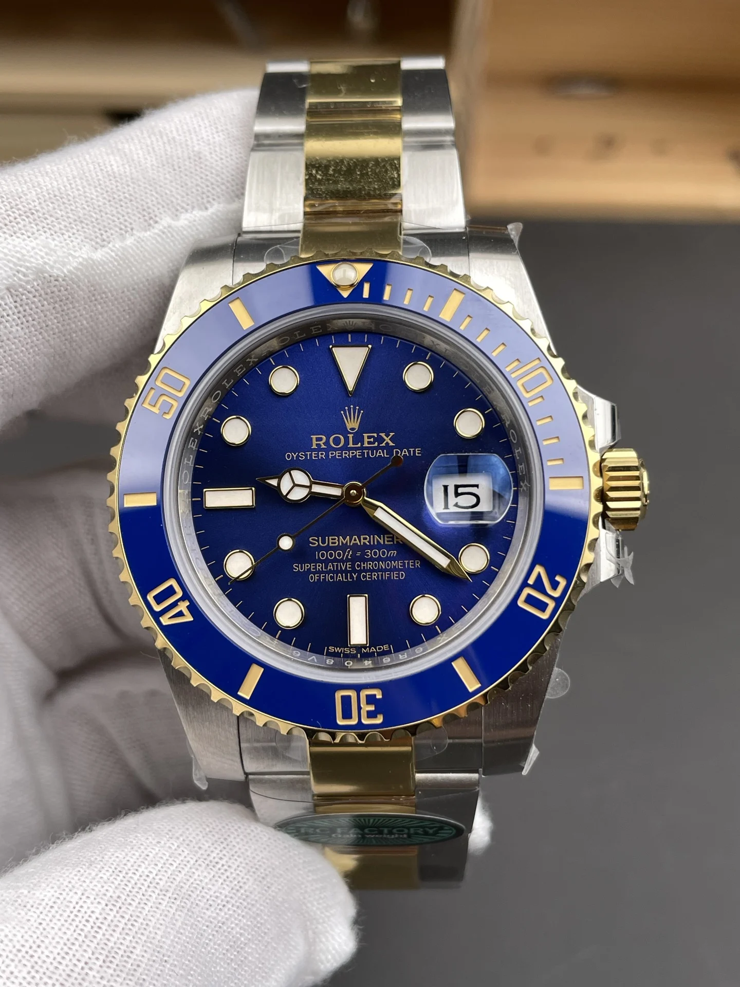 Rolex Submariner Two-Tone Blue Dial 40mm — photographed off the sweep