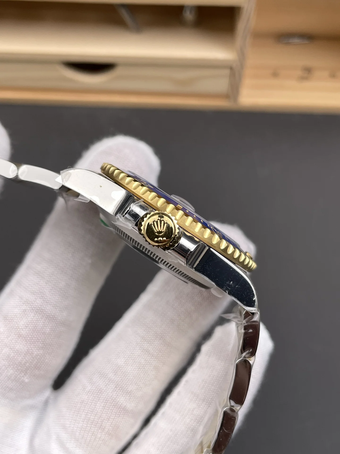 Rolex Submariner Two-Tone Blue Dial 40mm — photographed off the sweep