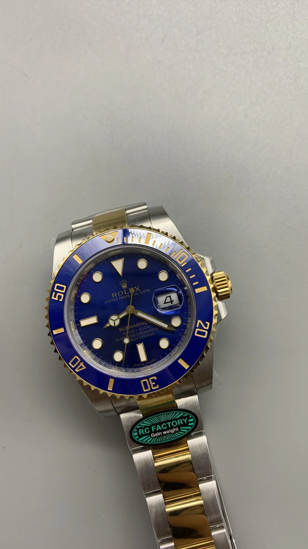 Rolex Submariner Two-Tone Blue Dial 40mm — photographed off the sweep