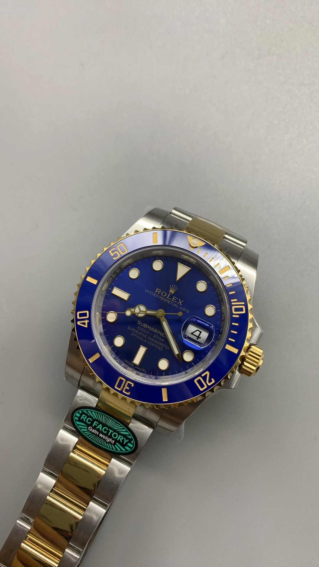 Rolex Submariner Two-Tone Blue Dial 40mm — photographed off the sweep