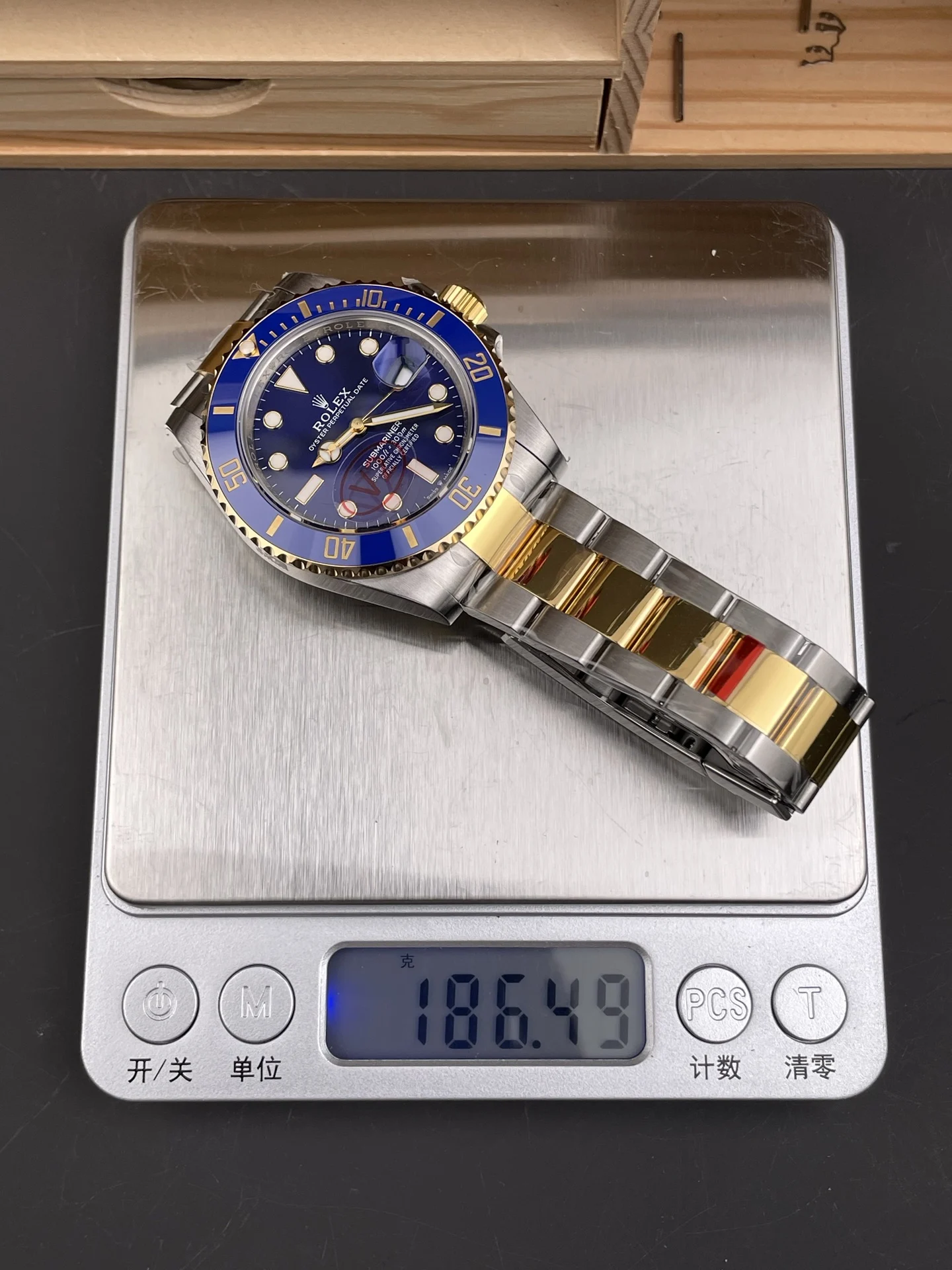 Rolex Submariner Two-Tone Blue Dial 41mm — photographed off the sweep