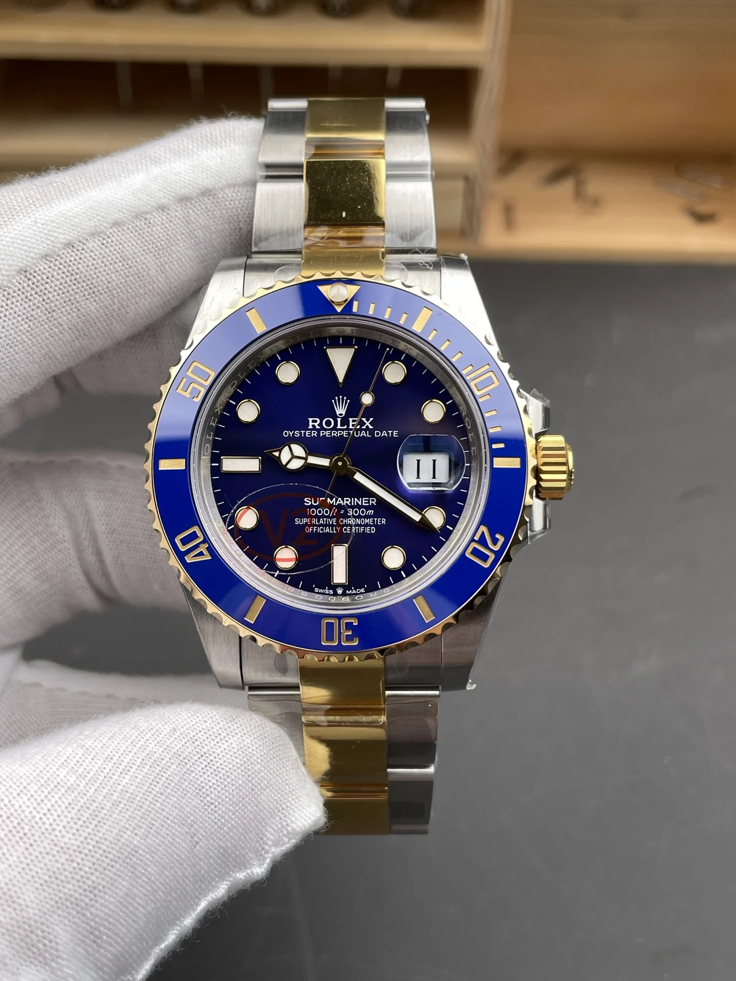 Rolex Submariner Two-Tone Blue Dial 41mm — photographed off the sweep